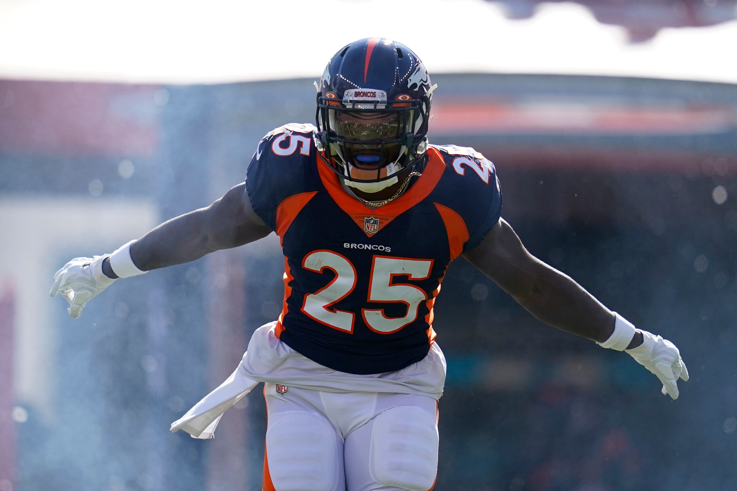Denver Broncos running back Melvin Gordon (25) takes the field prior to an NFL football game against the Las Vegas Raiders, Sunday, Oct. 17, 2021, in Denver. (AP Photo/Jack Dempsey)