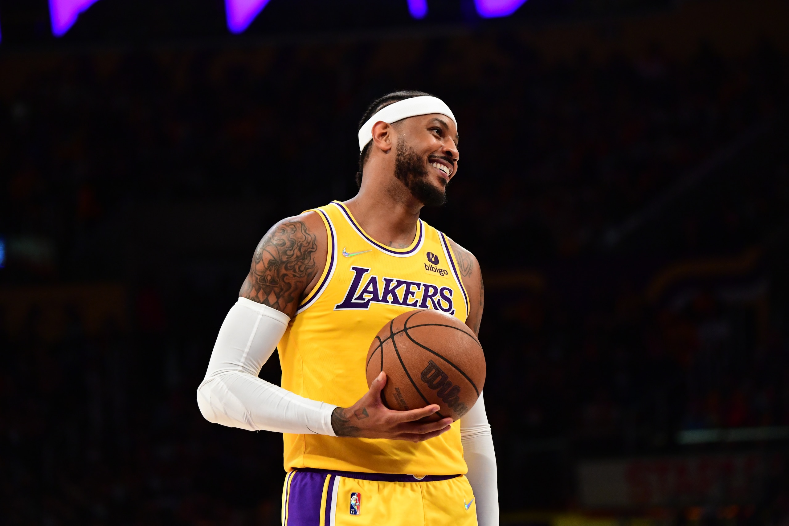 LOS ANGELES, CA - OCTOBER 19: Carmelo Anthony #7 of the Los Angeles Lakers smiles during the game against the Golden State Warriors on October 19, 2021 at STAPLES Center in Los Angeles, California. NOTE TO USER: User expressly acknowledges and agrees that, by downloading and/or using this Photograph, user is consenting to the terms and conditions of the Getty Images License Agreement. Mandatory Copyright Notice: Copyright 2021 NBAE (Photo by Adam Pantozzi/NBAE via Getty Images)