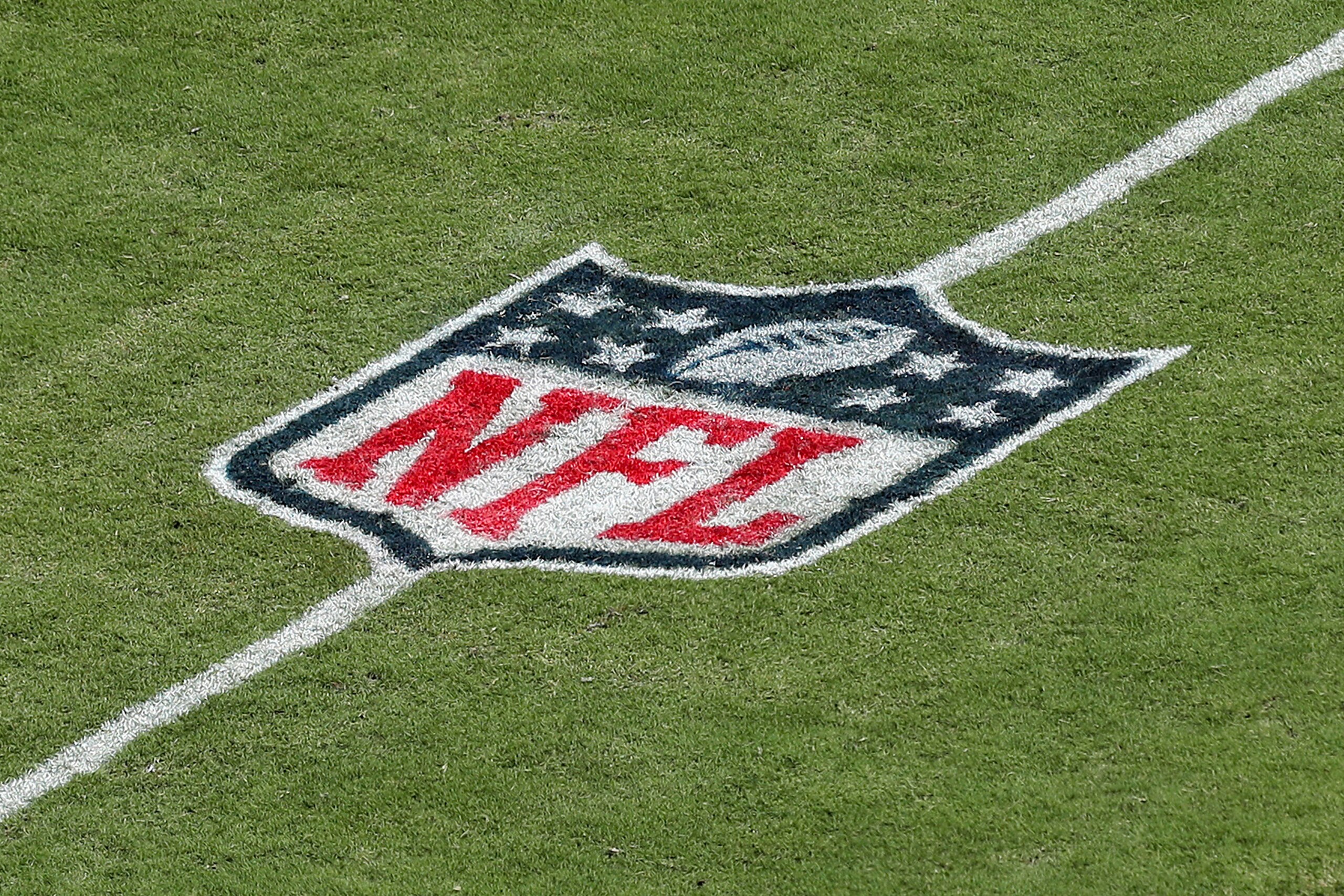 The National Football League logo is seen on the field during a NFL football game, Sunday, Oct. 10, 2021 in Tampa, Fla. (AP Photo/Alex Menendez)