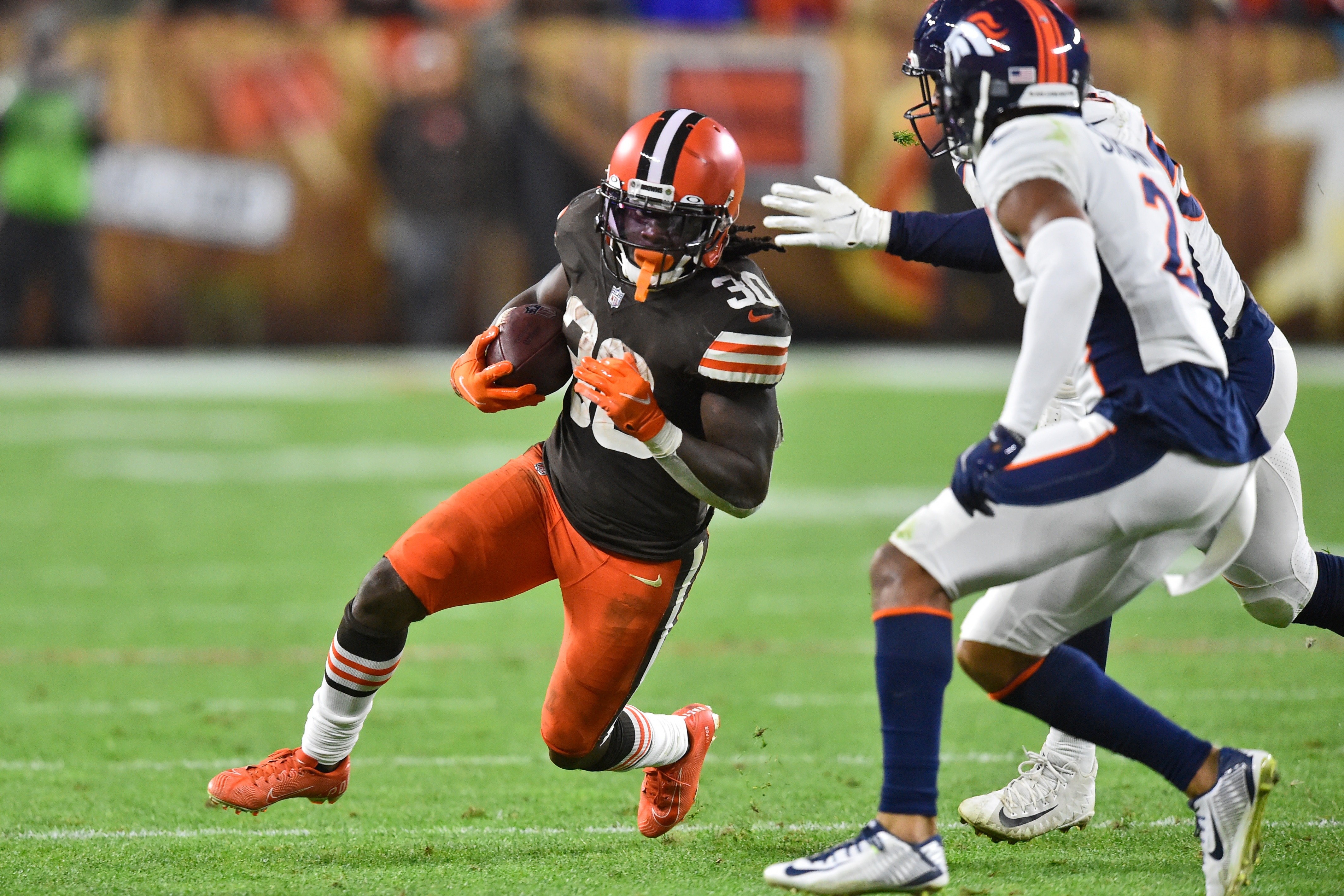 Cleveland Browns running back D'Ernest Johnson (30) runs with the ball against the Denver Broncos during the second half of an NFL football game, Thursday, Oct. 21, 2021, in Cleveland. (AP Photo/David Richard)