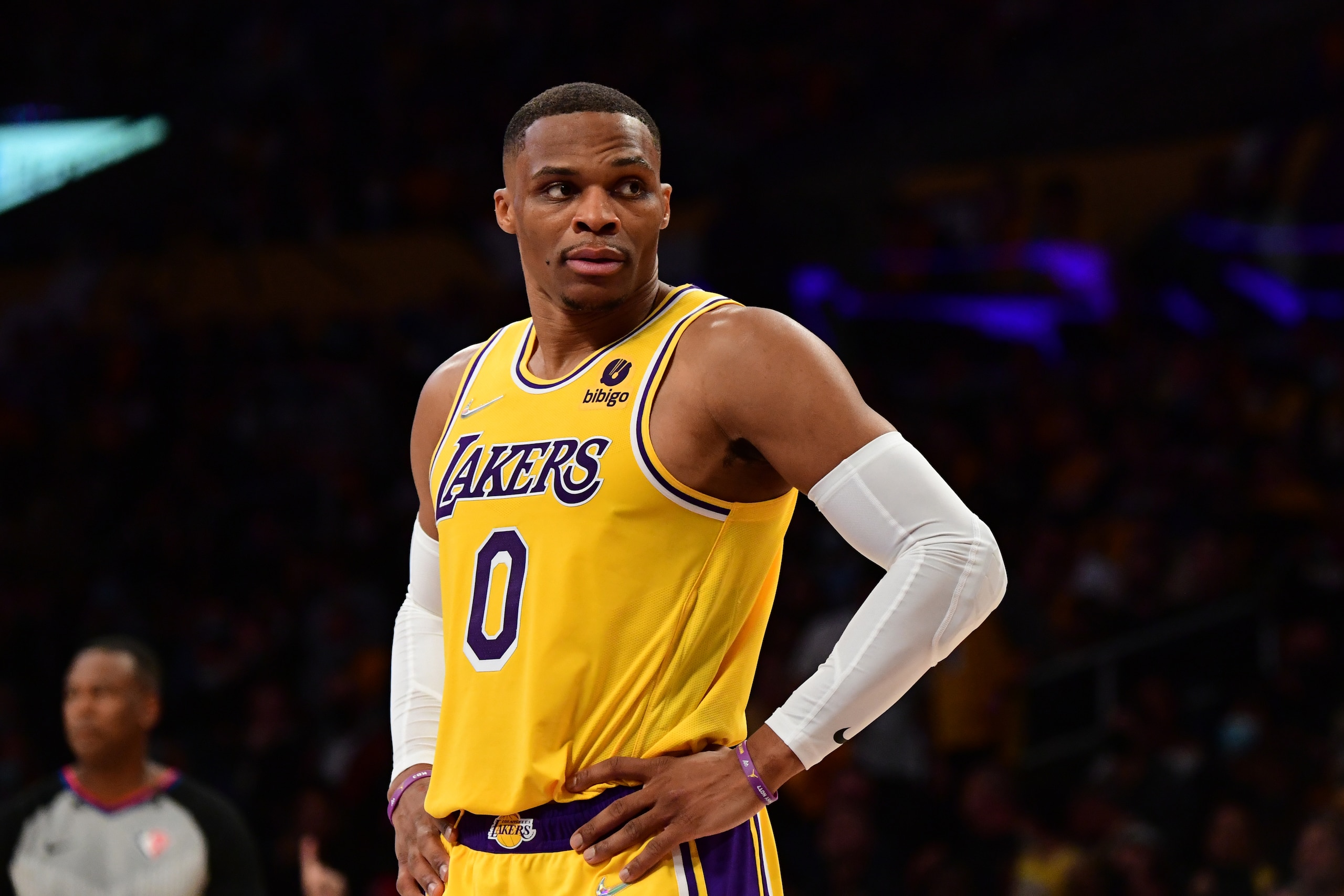 LOS ANGELES, CA - OCTOBER 19: Russell Westbrook #0 of the Los Angeles Lakers looks on during the game against the Golden State Warriors on October 19, 2021 at STAPLES Center in Los Angeles, California. NOTE TO USER: User expressly acknowledges and agrees that, by downloading and/or using this Photograph, user is consenting to the terms and conditions of the Getty Images License Agreement. Mandatory Copyright Notice: Copyright 2021 NBAE (Photo by Adam Pantozzi/NBAE via Getty Images)