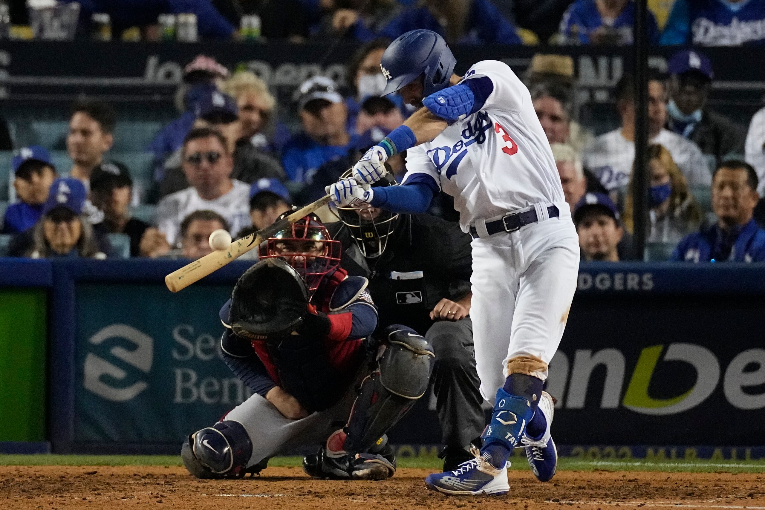 Los Angeles Dodgers' Chris Taylor hits a solo home run in the seventh inning against the Atlanta Braves in Game 5 of baseball's National League Championship Series Thursday, Oct. 21, 2021, in Los Angeles. (AP Photo/Marcio Jose Sanchez) Los Angeles Dodgers' Chris Taylor hits a solo home run in the seventh inning against the Atlanta Braves in Game 5 of baseball's National League Championship Series Thursday, Oct. 21, 2021, in Los Angeles. (AP Photo/Marcio Jose Sanchez)