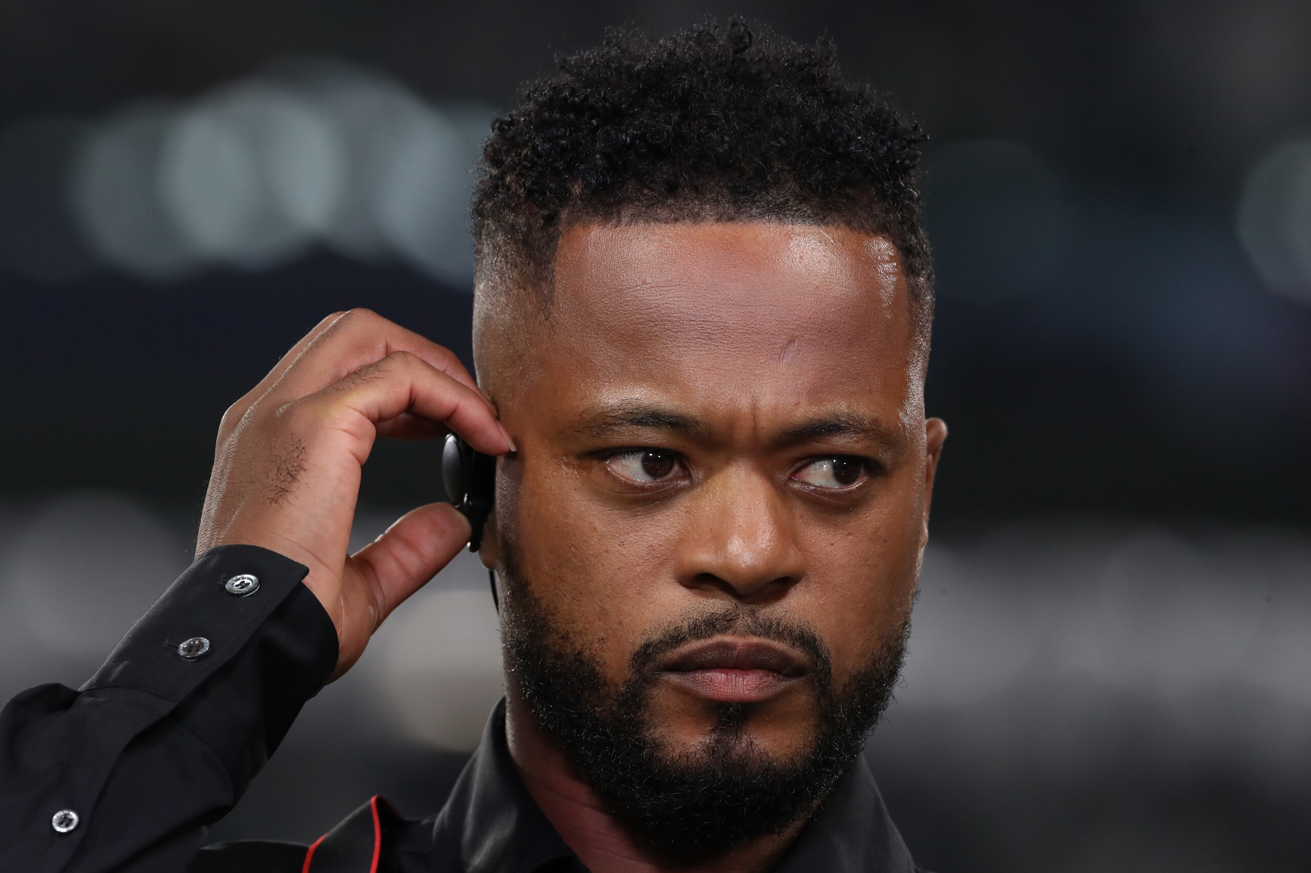 TURIN, ITALY - SEPTEMBER 29: Former Manchester United, Juventus and France defender Patrice Evra reacts whilst commentating for Amazon Prime prior to the UEFA Champions League group H match between Juventus and Chelsea FC at  on September 29, 2021 in Turin, Italy. (Photo by Jonathan Moscrop/Getty Images)