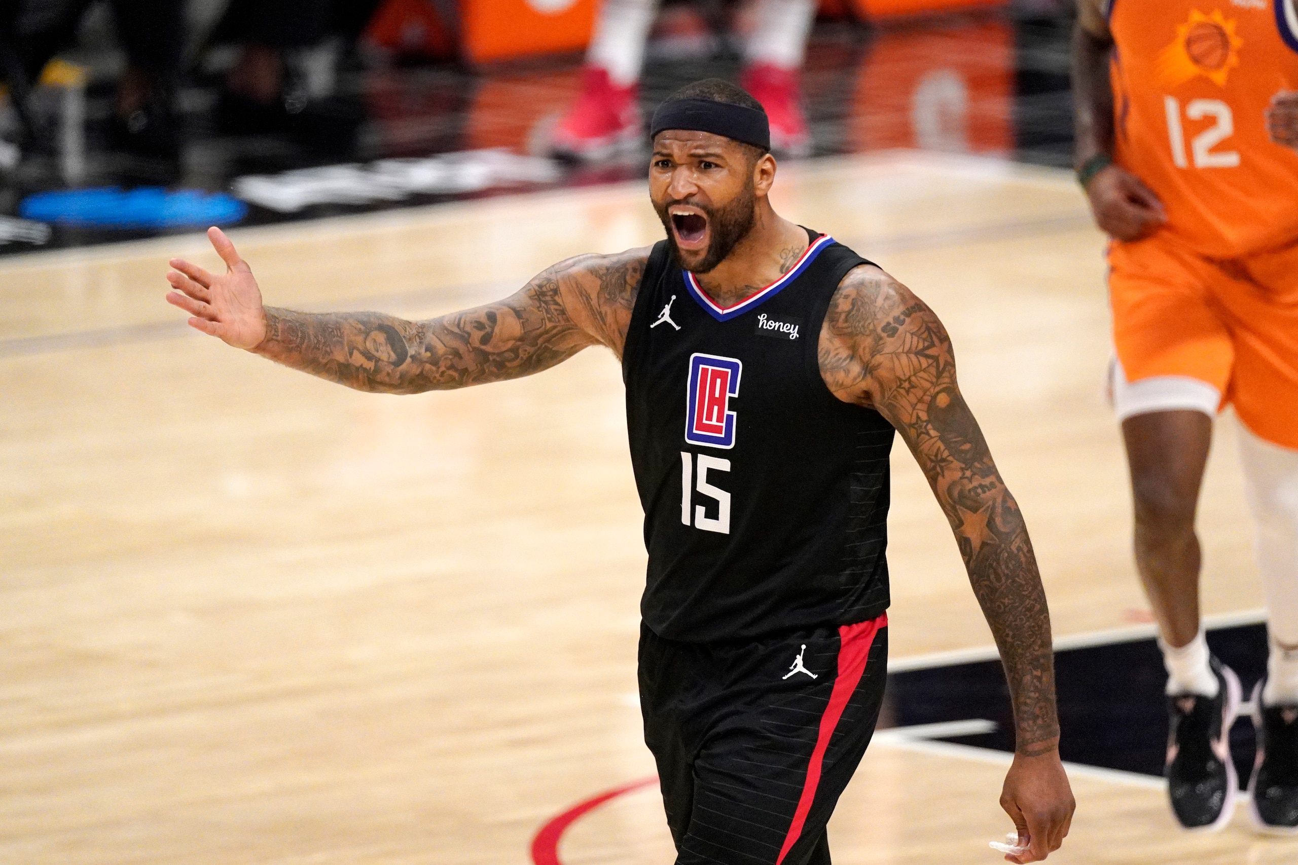 Los Angeles Clippers center DeMarcus Cousins asks for a foul call agains the Phoenix Suns during the second half in Game 6 of the NBA basketball Western Conference Finals Wednesday, June 30, 2021, in Los Angeles. (AP Photo/Mark J. Terrill)