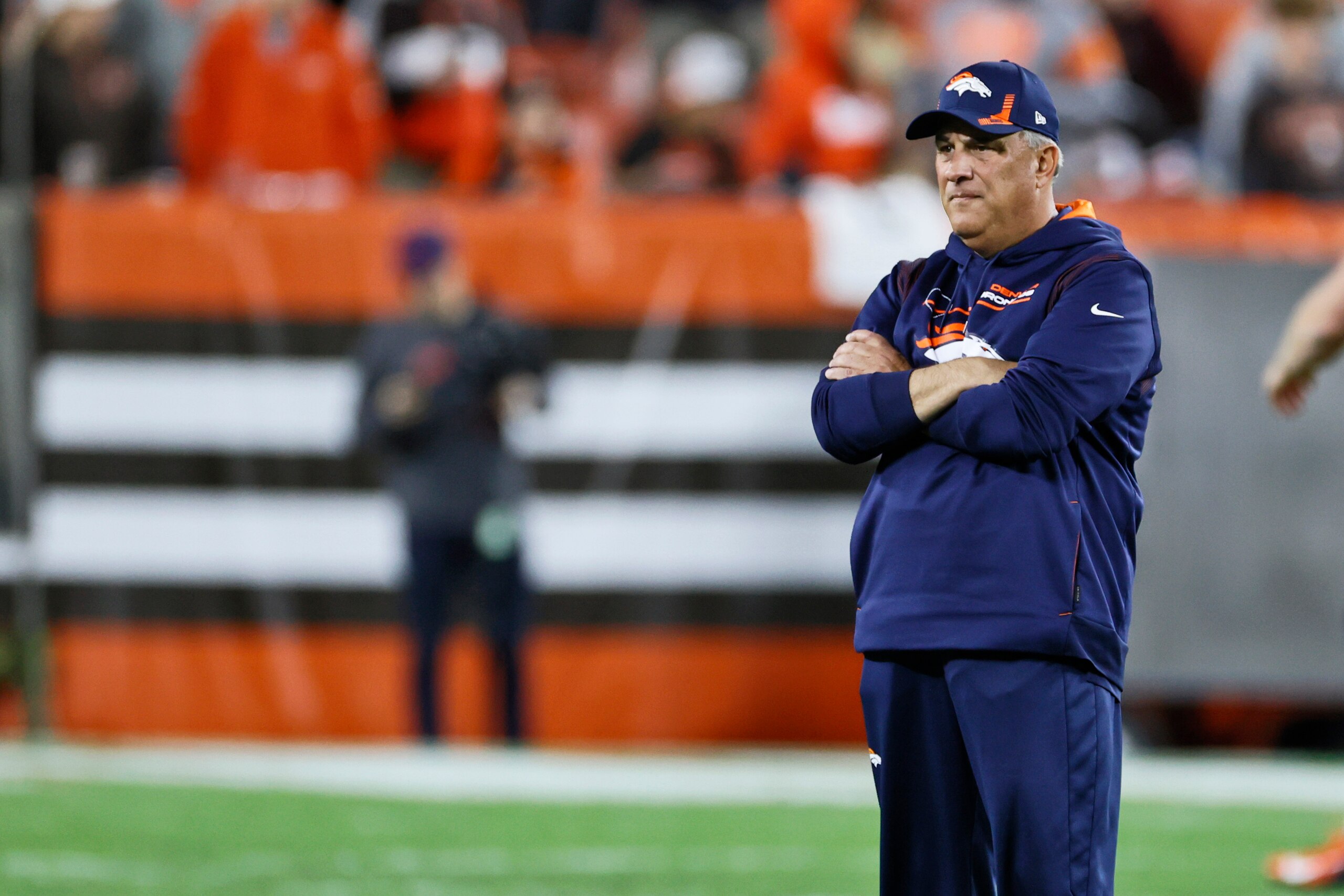 Denver Broncos head coach Vic Fangio watches during warm-ups before an NFL football game against the Cleveland Browns, Thursday, Oct. 21, 2021, in Cleveland. (AP Photo/Ron Schwane) Denver Broncos head coach Vic Fangio watches during warm-ups before an NFL football game against the Cleveland Browns, Thursday, Oct. 21, 2021, in Cleveland. (AP Photo/Ron Schwane)