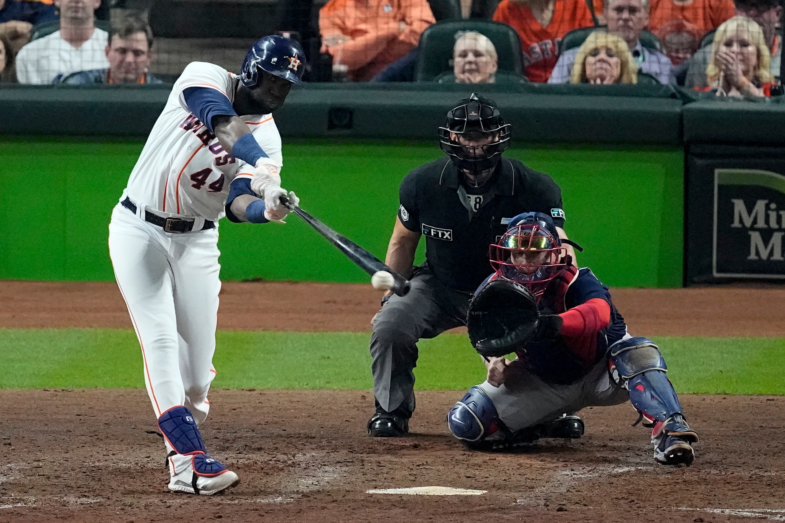 Houston Astros' Yordan Alvarez hits a triple against the Boston Red Sox during the sixth inning in Game 6 of baseball's American League Championship Series Friday, Oct. 22, 2021, in Houston. (AP Photo/Sue Ogrocki)
