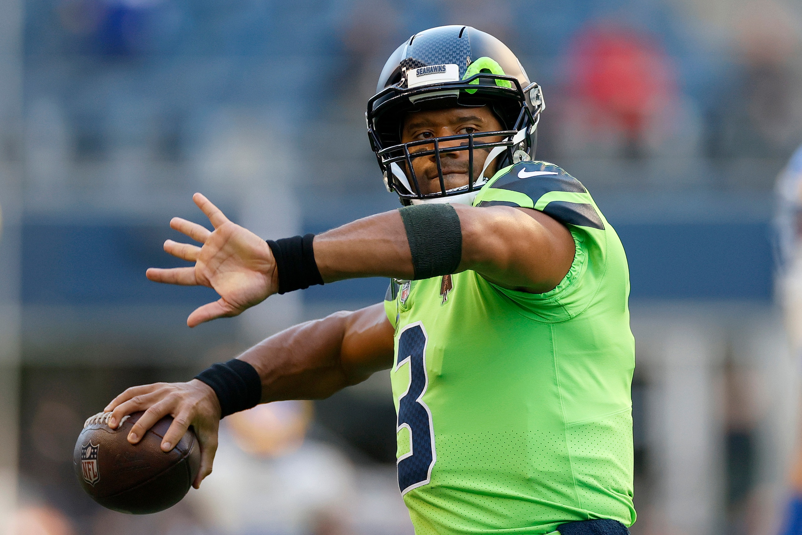 SEATTLE, WASHINGTON - OCTOBER 07: Russell Wilson #3 of the Seattle Seahawks warms up before the game against the Los Angeles Rams at Lumen Field on October 07, 2021 in Seattle, Washington. (Photo by Steph Chambers/Getty Images)