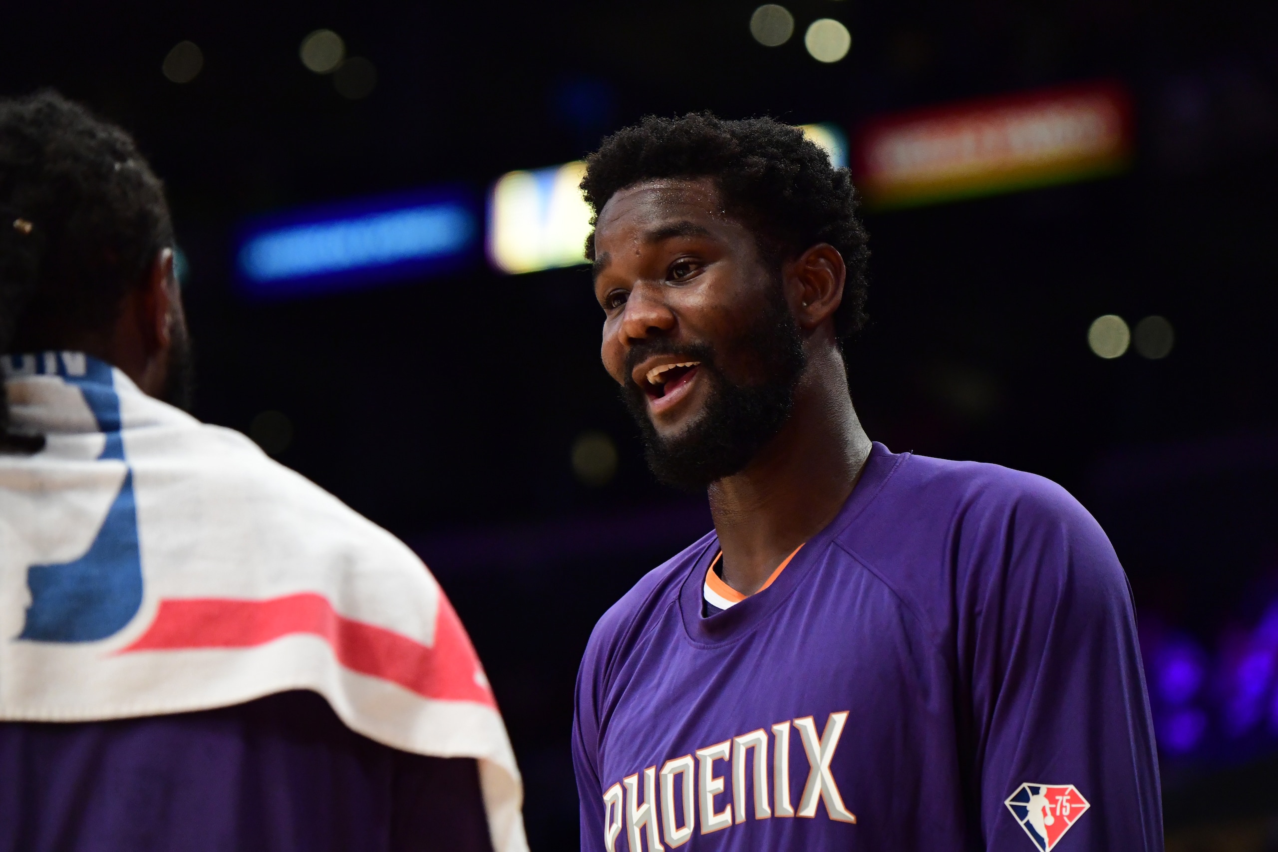 LOS ANGELES, CA - OCTOBER 10: Deandre Ayton #22 of the Phoenix Suns smiles during a preseason game against the Los Angeles Lakers on October 10, 2021 at STAPLES Center in Los Angeles, California. NOTE TO USER: User expressly acknowledges and agrees that, by downloading and/or using this Photograph, user is consenting to the terms and conditions of the Getty Images License Agreement. Mandatory Copyright Notice: Copyright 2021 NBAE (Photo by Adam Pantozzi/NBAE via Getty Images)