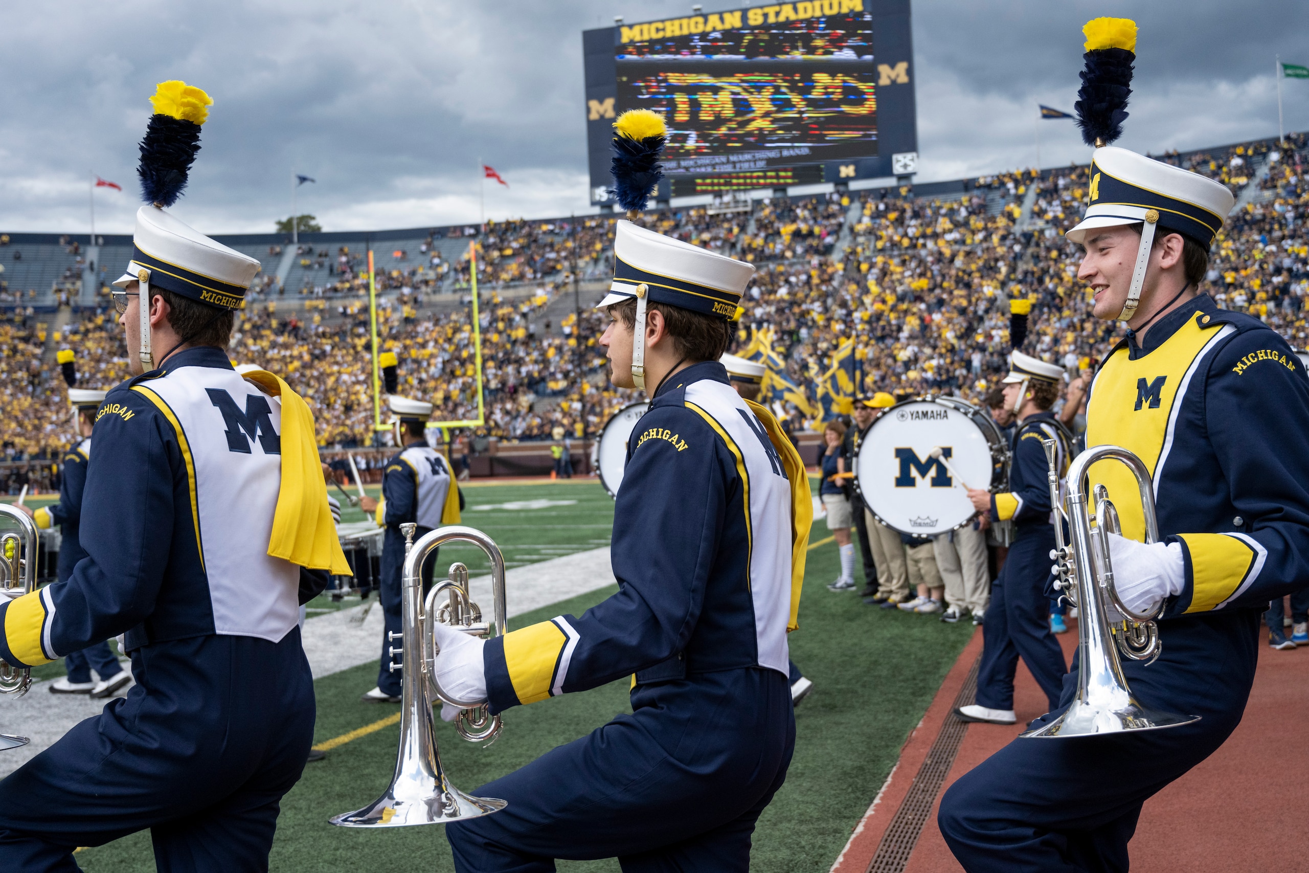ANN ARBOR, MICHIGAN - SEPTEMBER 25: The Michigan Wolverines Marching Band takes the field before the game against the Rutgers Scarlet Knights at Michigan Stadium on September 25, 2021 in Ann Arbor, Michigan. (Photo by Gaelen Morse/Getty Images)