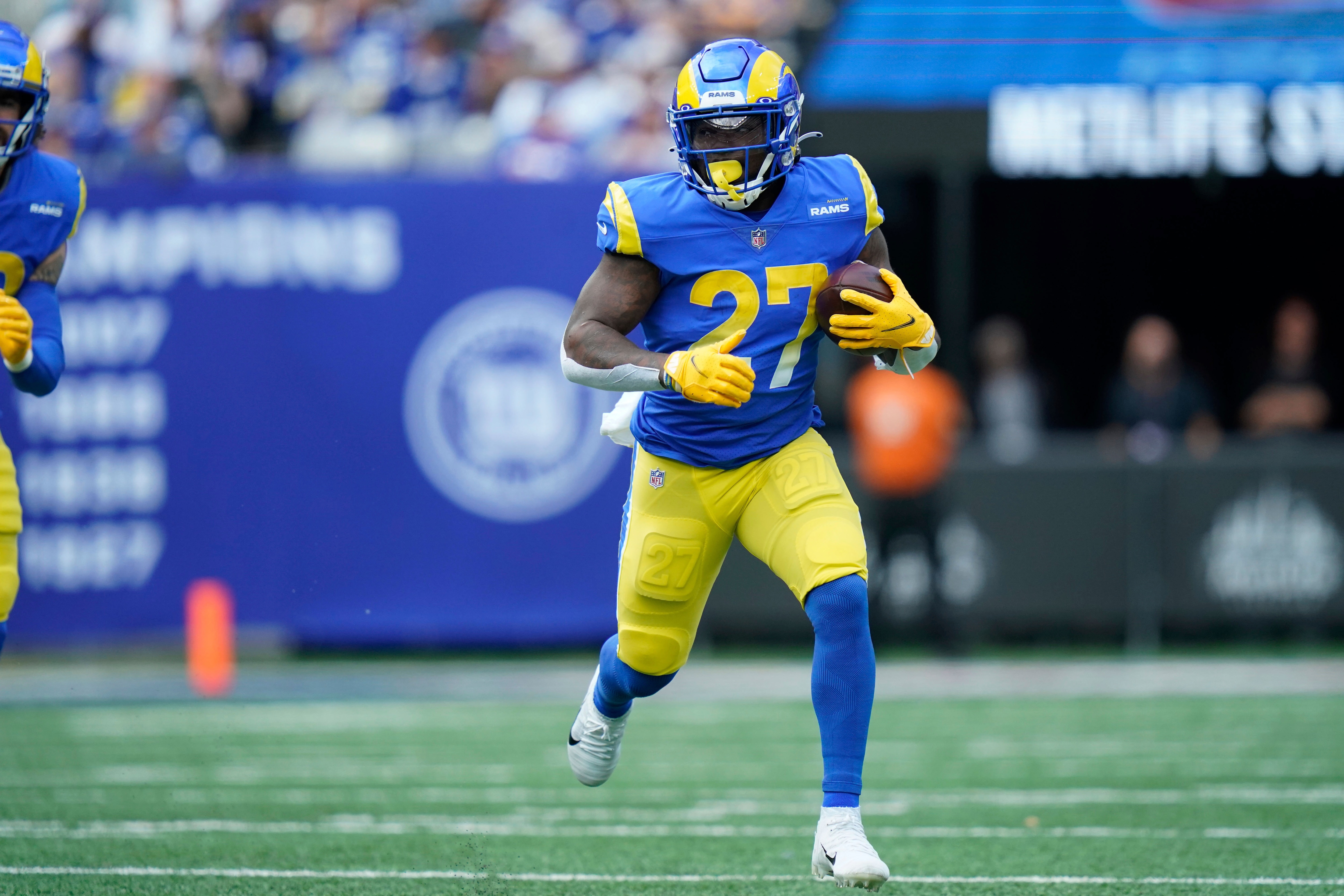 Los Angeles Rams' Darrell Henderson runs the ball during the first half of an NFL football game against the New York Giants, Sunday, Oct. 17, 2021, in East Rutherford, N.J. (AP Photo/Frank Franklin II)