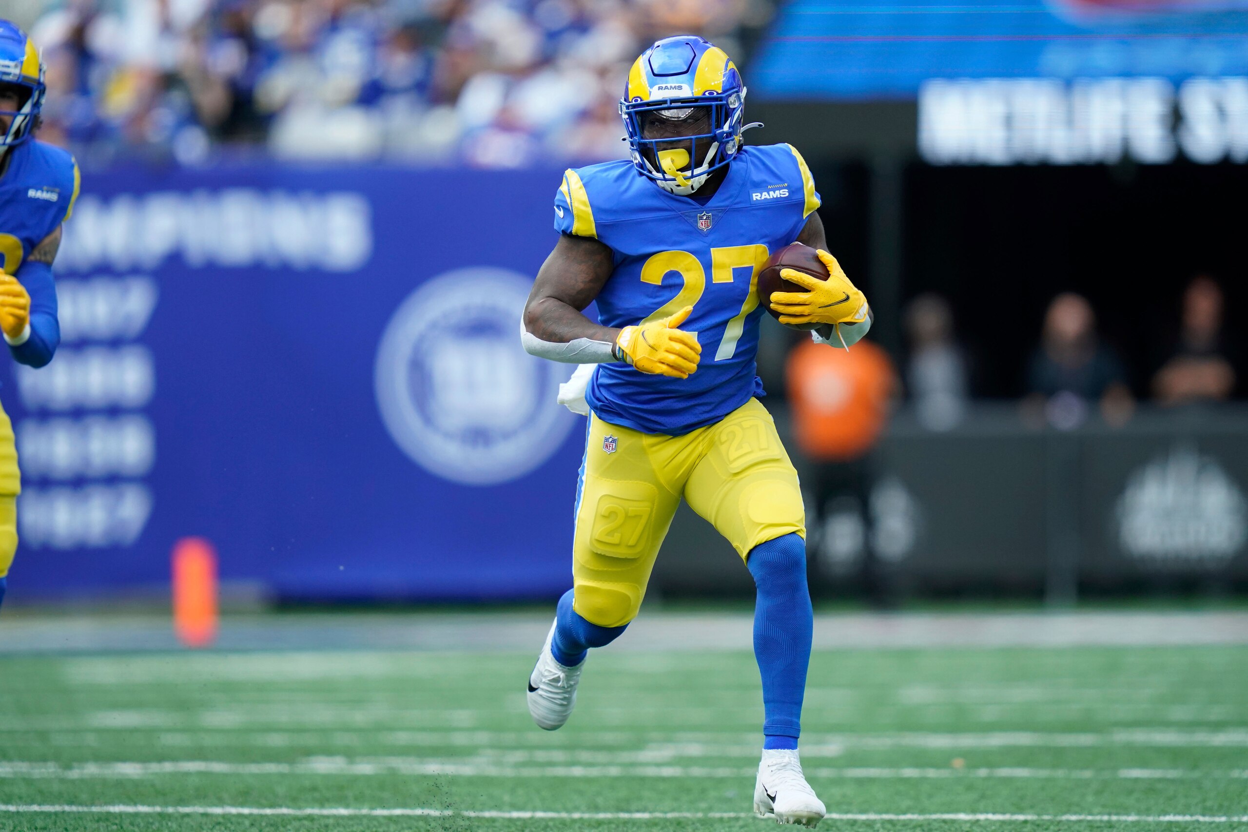 Los Angeles Rams' Darrell Henderson runs the ball during the first half of an NFL football game against the New York Giants, Sunday, Oct. 17, 2021, in East Rutherford, N.J. (AP Photo/Frank Franklin II)