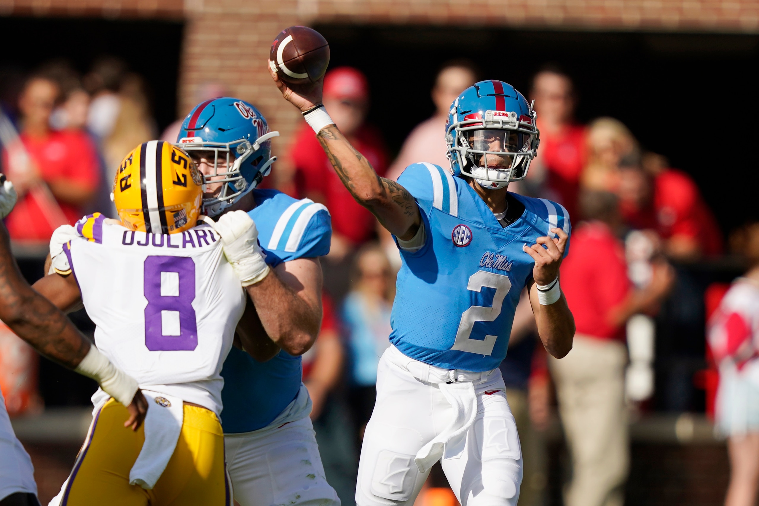 Mississippi quarterback Matt Corral (2) passes during the first half of an NCAA college football game against LSU in Oxford, Miss., Saturday, Oct. 23, 2021. (AP Photo/Rogelio V. Solis)