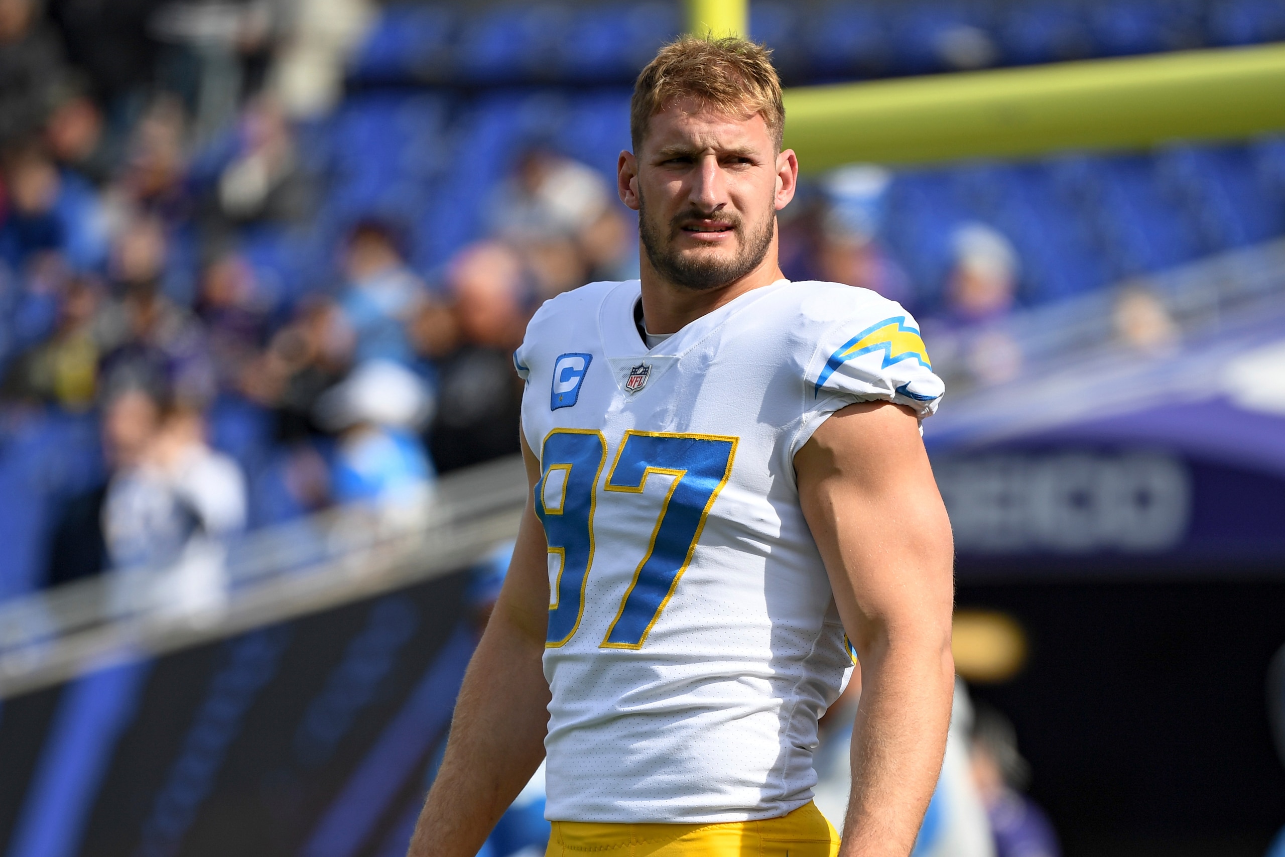 Los Angeles Chargers defensive end Joey Bosa (97) looks on during pre-game warm-ups before an NFL football game against the Baltimore Ravens, Sunday, Oct. 17, 2021, in Baltimore, Md. (AP Photo/Terrance Williams)