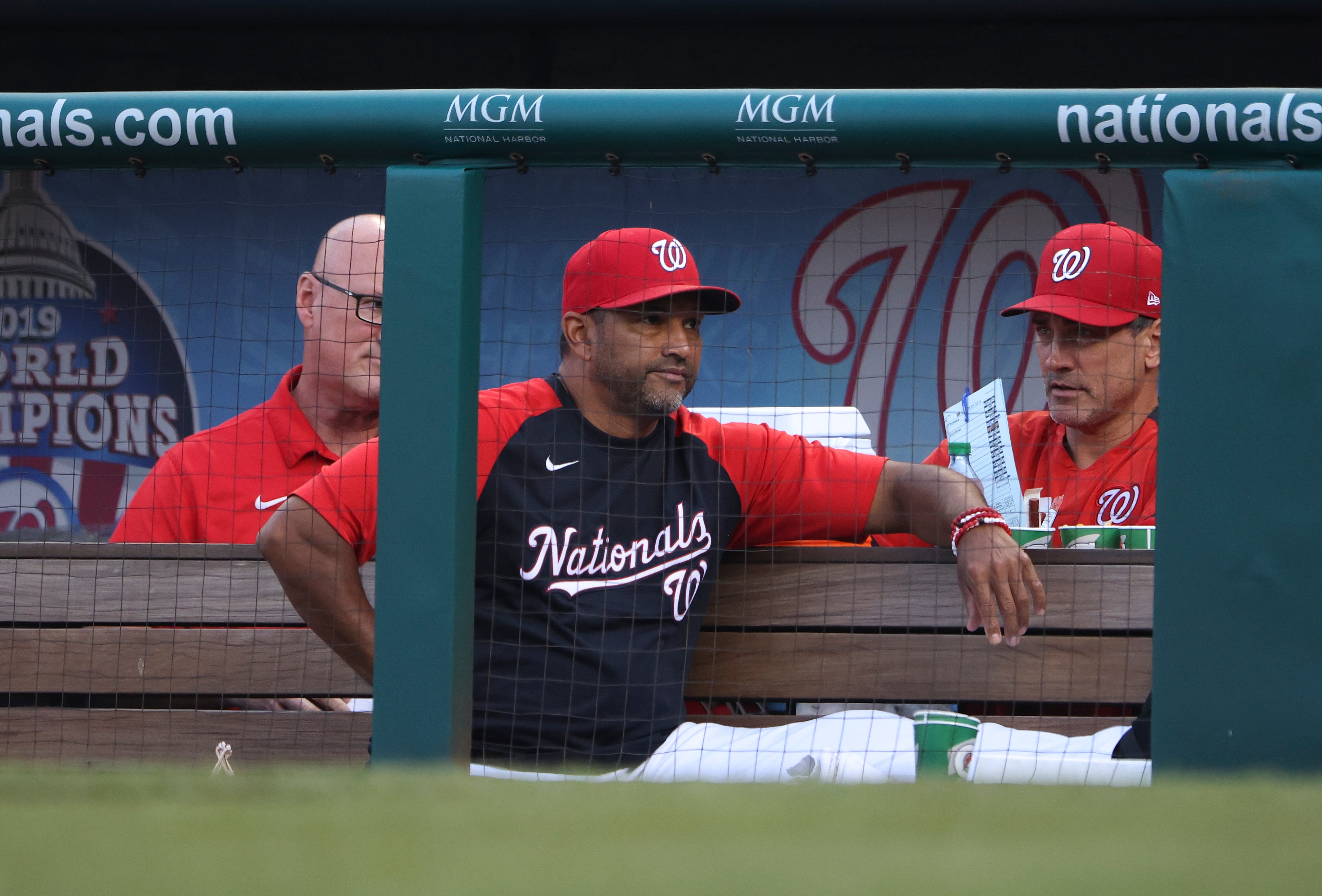 WASHINGTON, DC - OCTOBER 02: Washington Nationals manager Dave Martinez watches from the dugout as the Nationals play the Boston Red Sox at Nationals Park on October 02, 2021 in Washington, DC. (Photo by Kevin Dietsch/Getty Images)