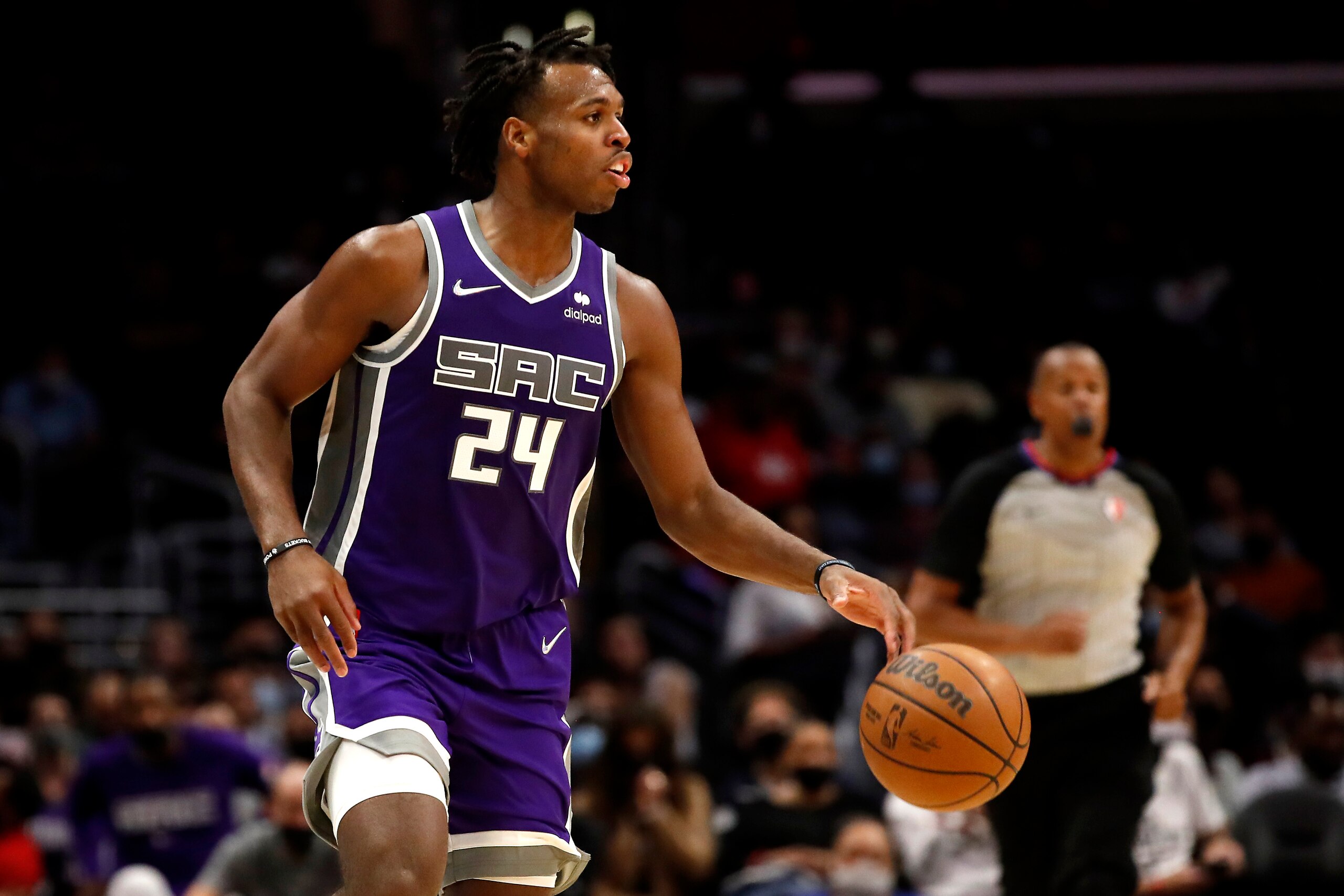 LOS ANGELES, CALIFORNIA - OCTOBER 06: Buddy Hield #24 of the Sacramento Kings dribbles during the third quarter of the preseason game against the Los Angeles Clippers at Staples Center on October 06, 2021 in Los Angeles, California. NOTE TO USER: User expressly acknowledges and agrees that, by downloading and/or using this Photograph, user is consenting to the terms and conditions of the Getty Images License Agreement. (Photo by Katelyn Mulcahy/Getty Images)