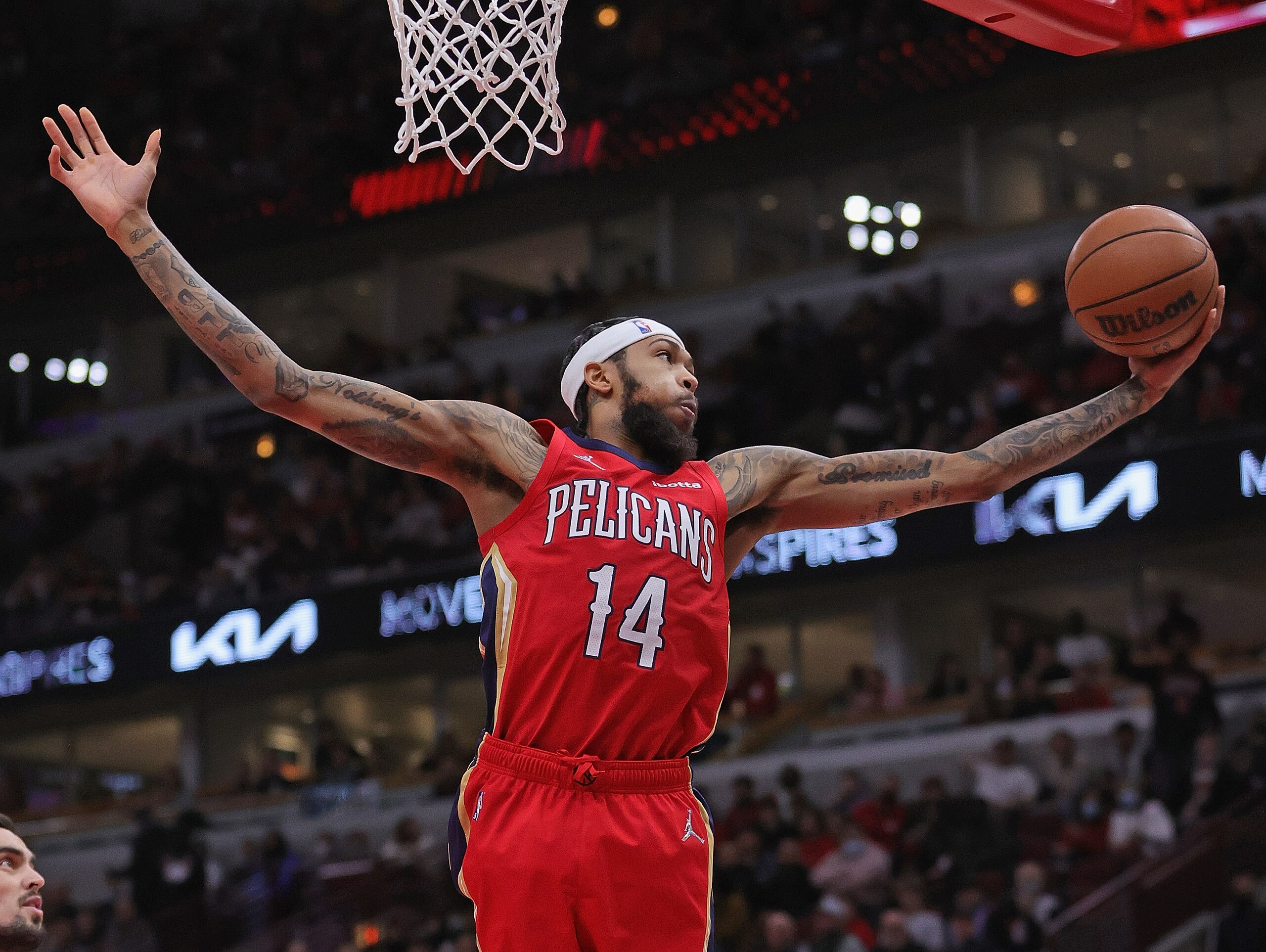 CHICAGO, ILLINOIS - OCTOBER 22: Brandon Ingram #14 of the New Orleans Pelicans rebounds against the Chicago Bulls at the United Center on October 22, 2021 in Chicago, Illinois. NOTE TO USER: User expressly acknowledges and agrees that, by downloading and or using this photograph, User is consenting to the terms and conditions of the Getty Images License Agreement. (Photo by Jonathan Daniel/Getty Images)