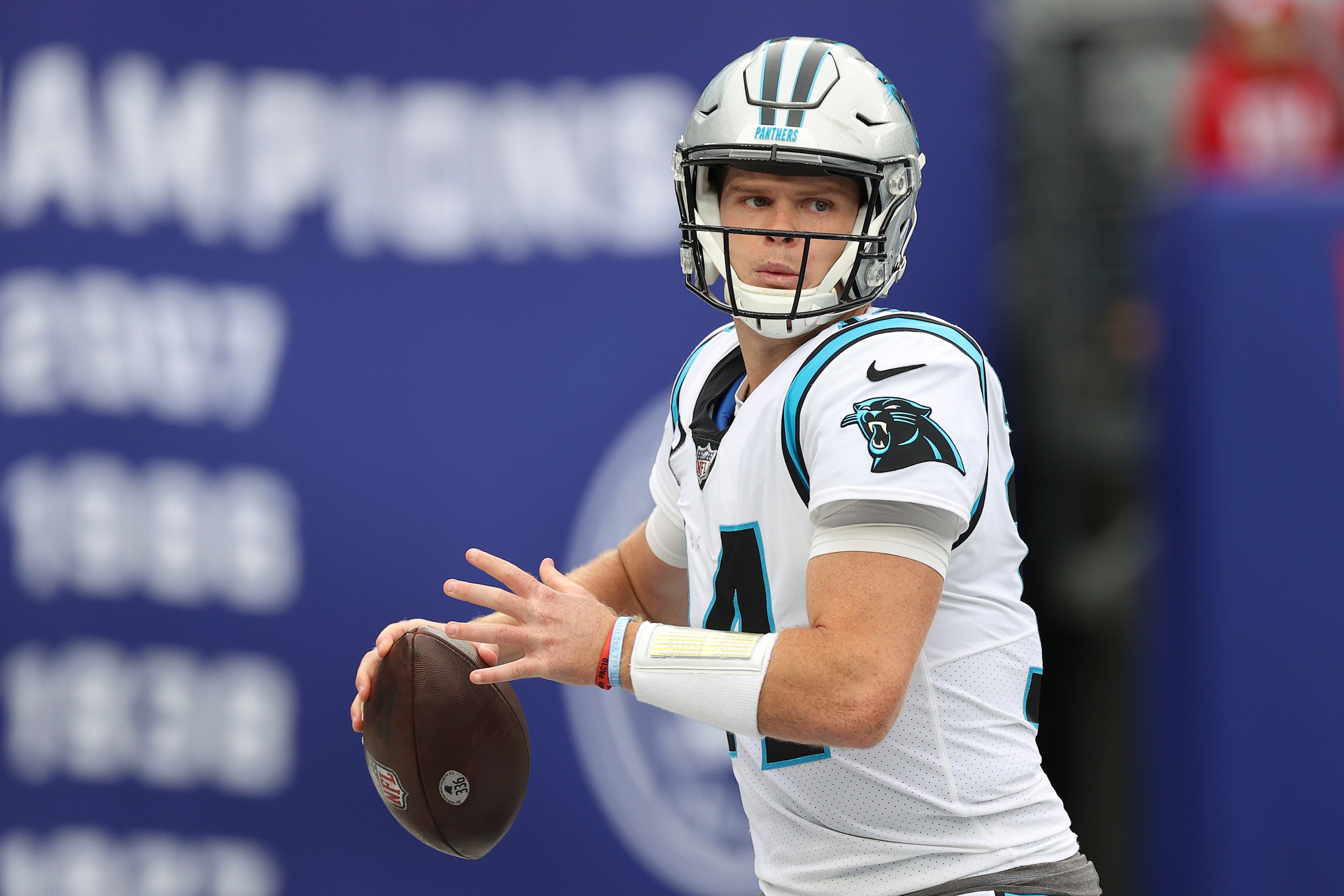 EAST RUTHERFORD, NEW JERSEY - OCTOBER 24: Sam Darnold #14 of the Carolina Panthers throws the ball during the first half in the game against the New York Giants at MetLife Stadium on October 24, 2021 in East Rutherford, New Jersey. (Photo by Al Bello/Getty Images)