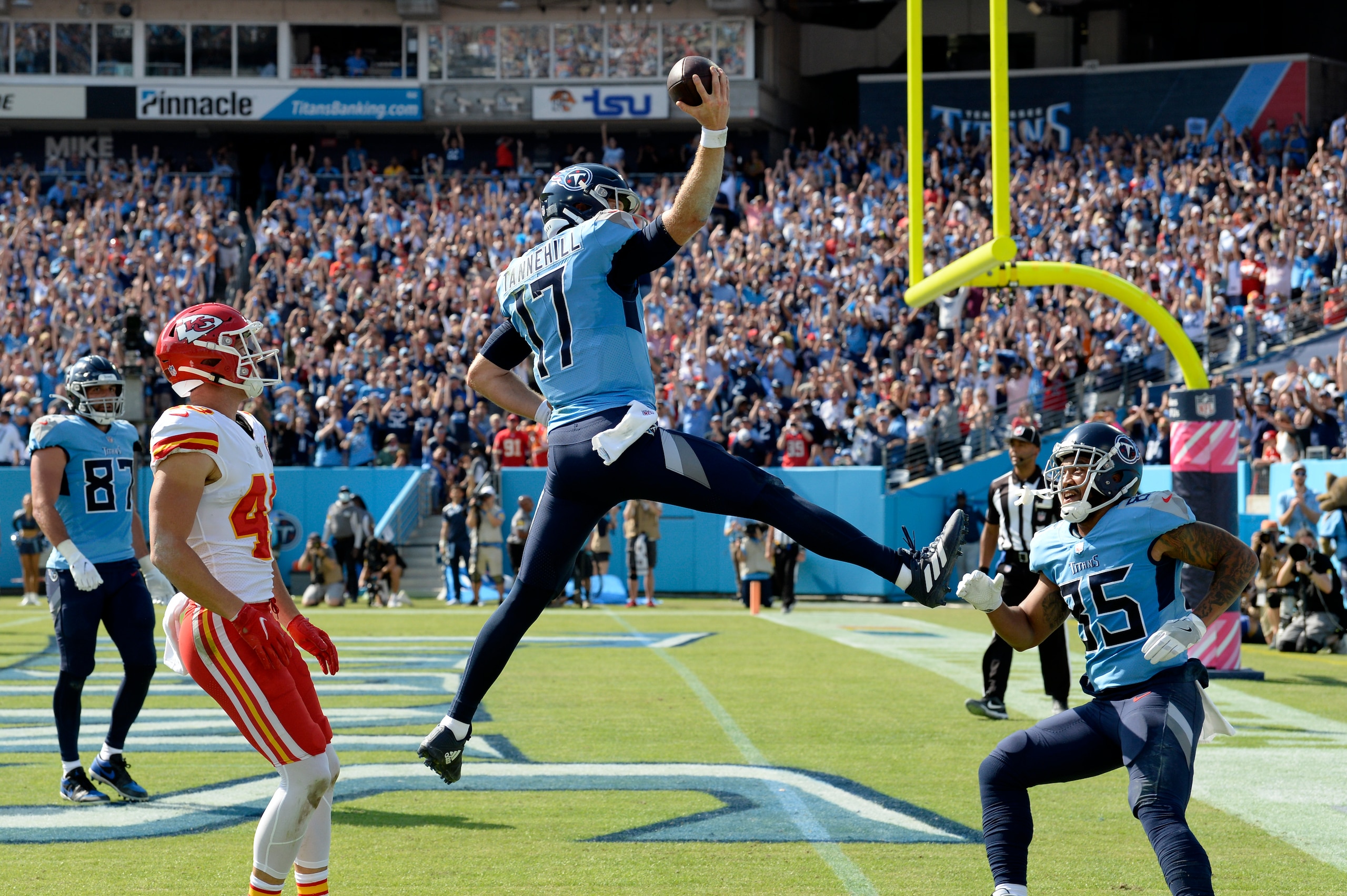 Tennessee Titans quarterback Ryan Tannehill (17) scores a touchdown against the Kansas City Chiefs in the first half of an NFL football game Sunday, Oct. 24, 2021, in Nashville, Tenn. (AP Photo/Mark Zaleski) Tennessee Titans quarterback Ryan Tannehill (17) scores a touchdown against the Kansas City Chiefs in the first half of an NFL football game Sunday, Oct. 24, 2021, in Nashville, Tenn. (AP Photo/Mark Zaleski)