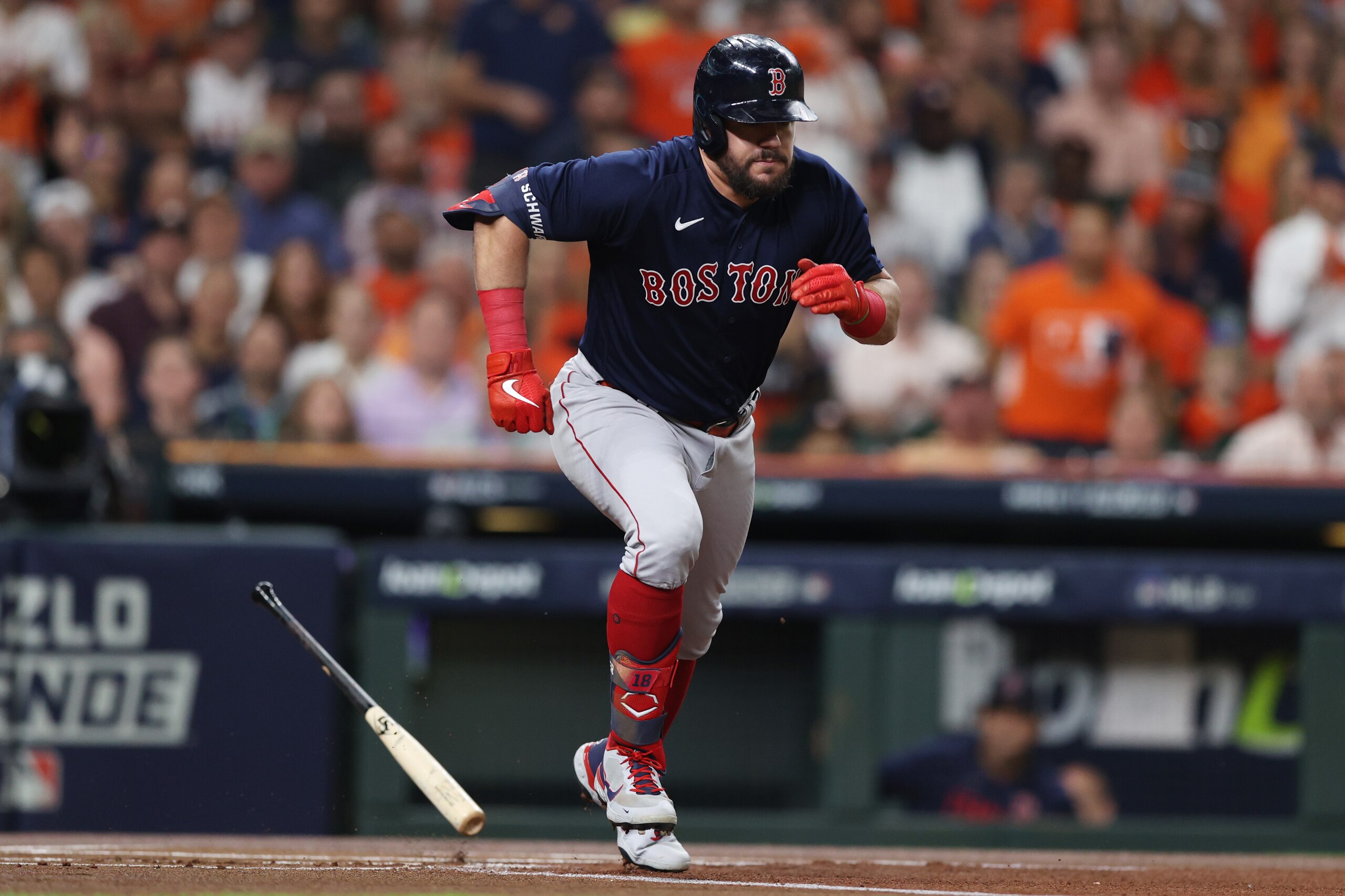 HOUSTON, TEXAS - OCTOBER 22: Kyle Schwarber #18 of the Boston Red Sox runs to first base on a wild pitch after striking out against the Houston Astros during the first inning in Game Six of the American League Championship Series at Minute Maid Park on October 22, 2021 in Houston, Texas. (Photo by Elsa/Getty Images)