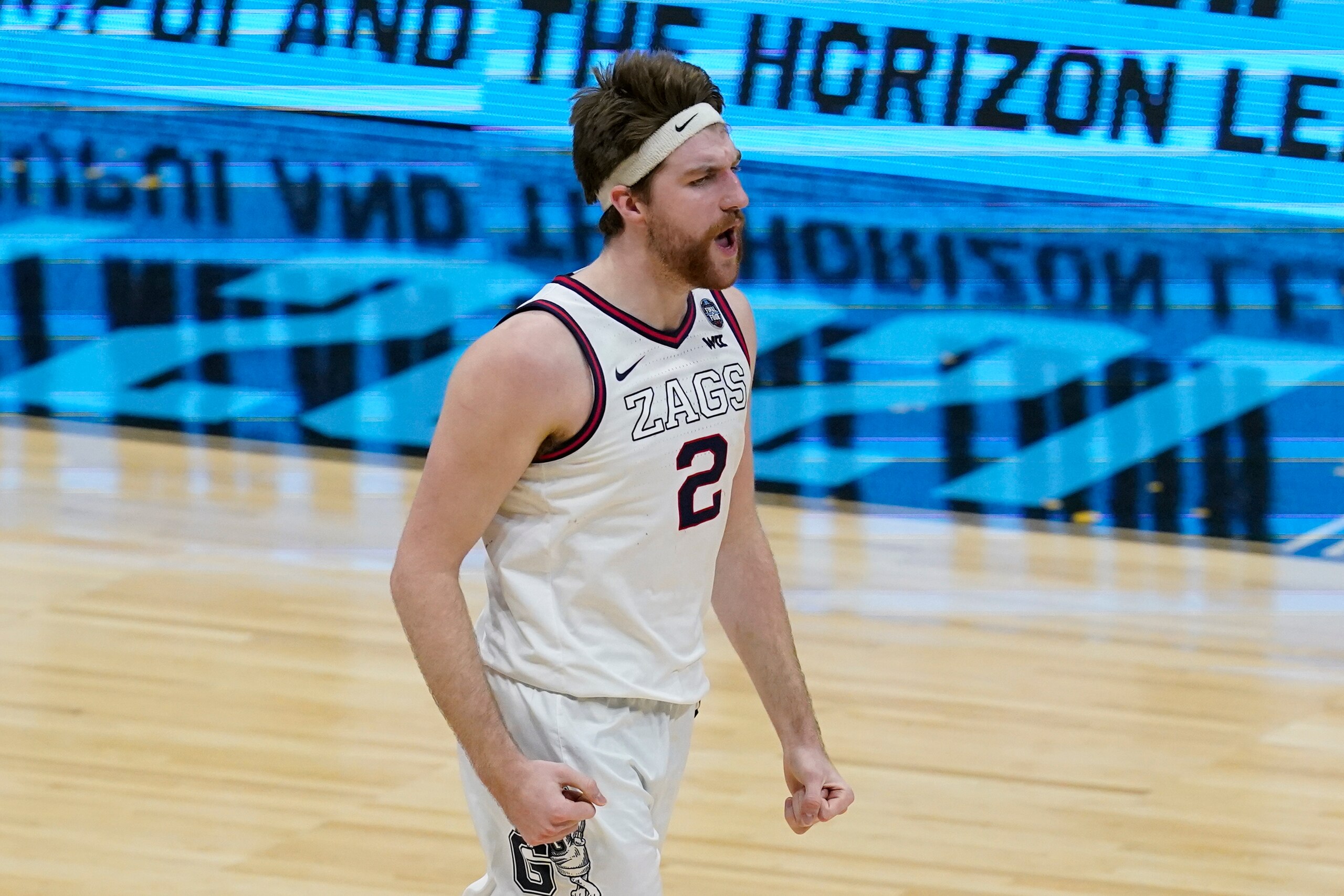 Gonzaga forward Drew Timme celebrates after a dunk during the second half of a men's Final Four NCAA college basketball tournament semifinal game against UCLA, Saturday, April 3, 2021, at Lucas Oil Stadium in Indianapolis. (AP Photo/Darron Cummings)