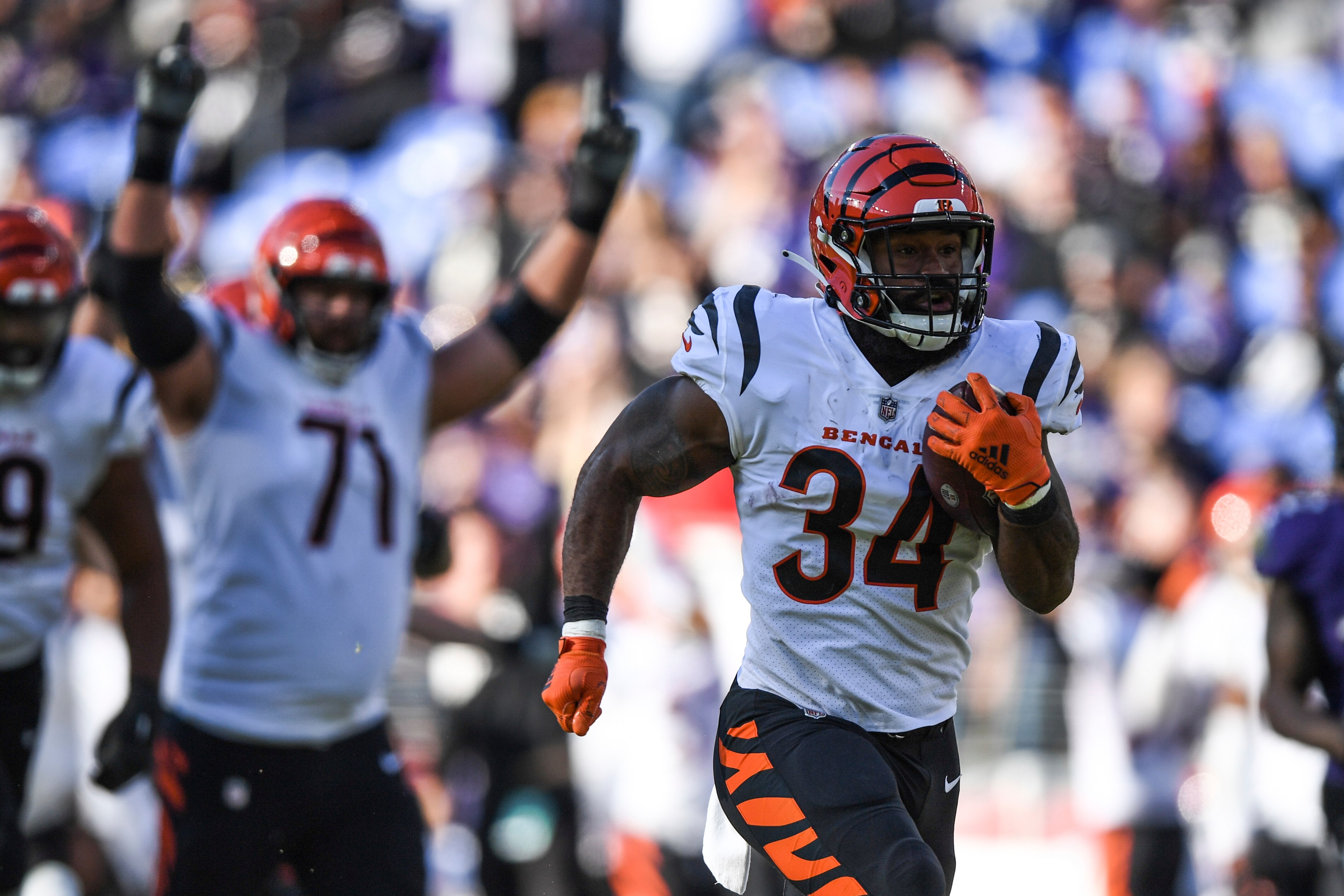 Cincinnati Bengals running back Samaje Perine (34) runs the ball during the fourth quarter for a touchdown in an NFL football game against the Baltimore Ravens, Sunday, Oct. 24, 2021, in Baltimore. (AP Photo/Terrance Williams)