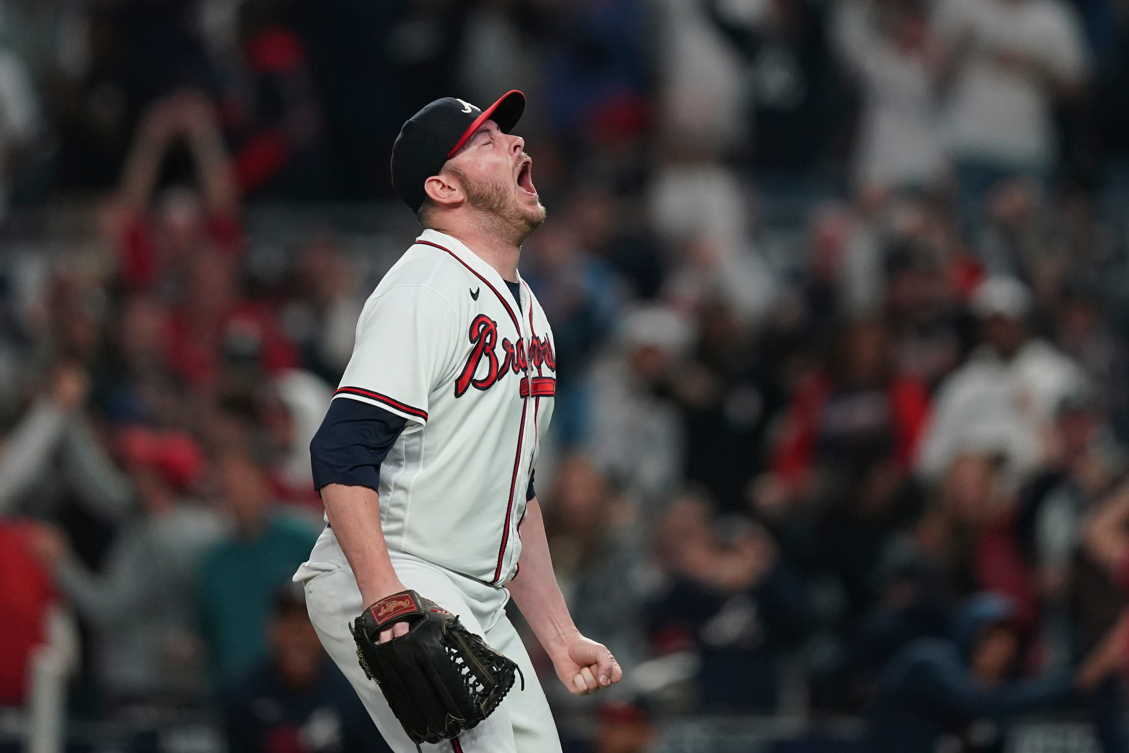 Atlanta Braves pitcher Tyler Matzek reacts after striking out Los Angeles Dodgers' Mookie Betts to end the seventh inning in Game 6 of baseball's National League Championship Series Saturday, Oct. 23, 2021, in Atlanta. (AP Photo/Brynn Anderson)