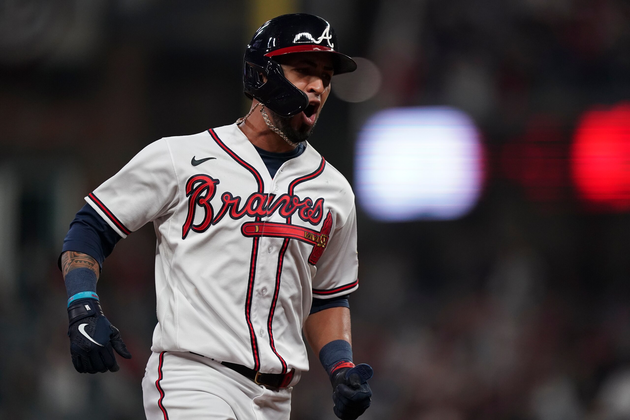Atlanta Braves' Eddie Rosario celebrates after hitting a three run home run during the fourth inning in Game 6 of baseball's National League Championship Series against the Los Angeles Dodgers Saturday, Oct. 23, 2021, in Atlanta. (AP Photo/Brynn Anderson) Atlanta Braves' Eddie Rosario celebrates after hitting a three run home run during the fourth inning in Game 6 of baseball's National League Championship Series against the Los Angeles Dodgers Saturday, Oct. 23, 2021, in Atlanta. (AP Photo/Brynn Anderson)