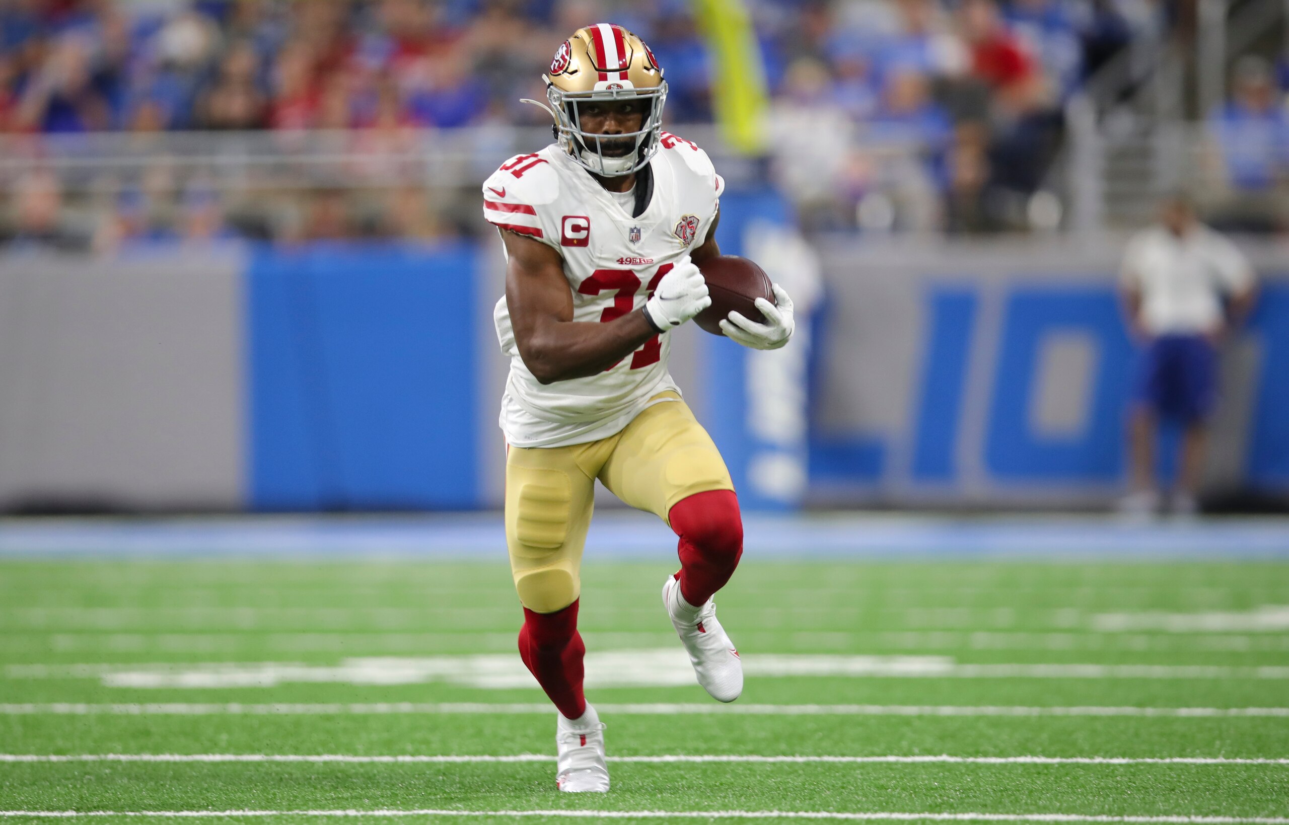 DETROIT, MI - SEPTEMBER 12: Raheem Mostert #31 of the San Francisco 49ers rushes during the game against the Detroit Lions at Ford Field on September 12, 2021 in Detroit, Michigan. The 49ers defeated the Lions 41-33. (Photo by Michael Zagaris/San Francisco 49ers/Getty Images)