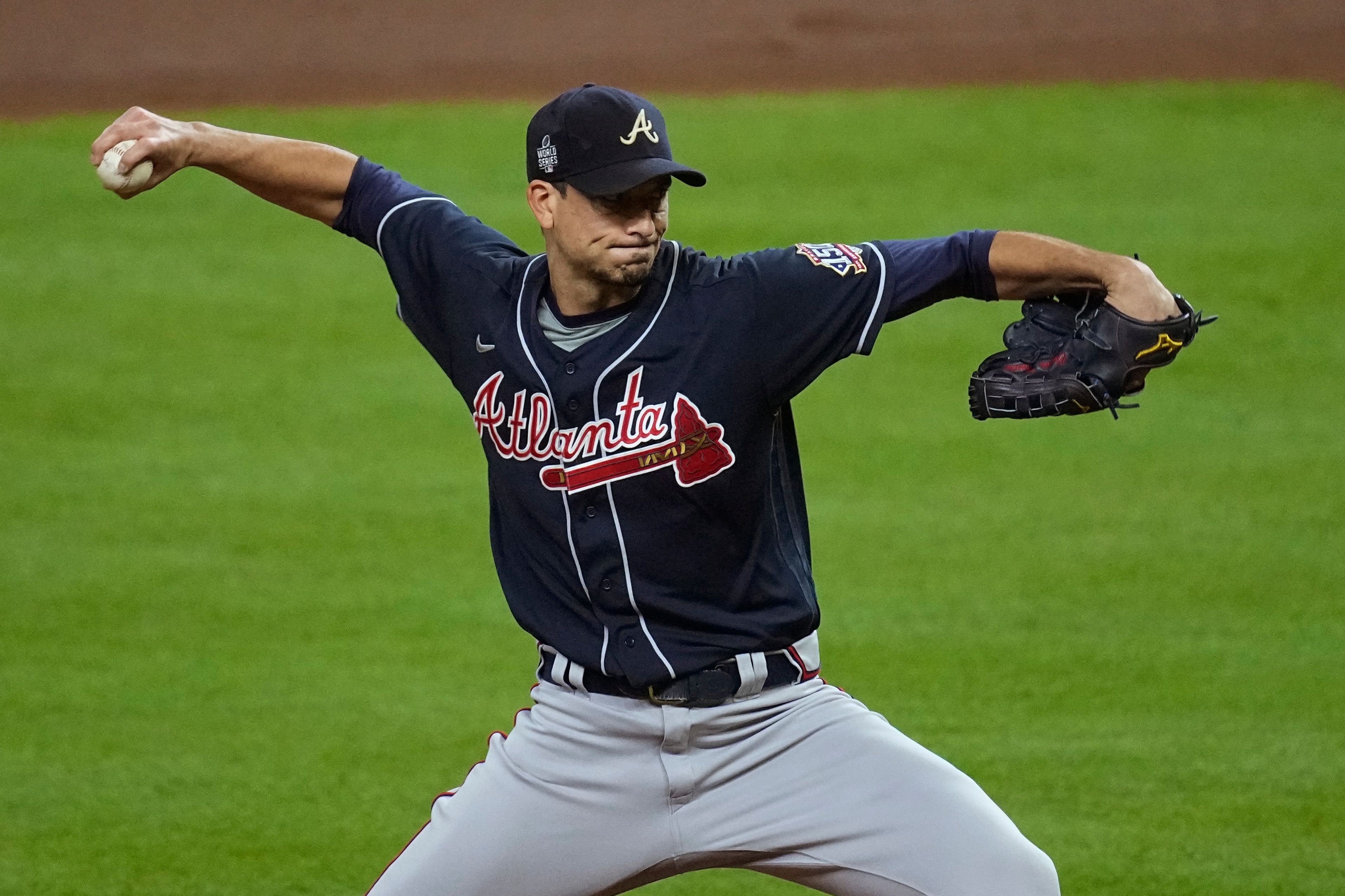 Atlanta Braves starting pitcher Charlie Morton throws during the first inning of Game 1 in baseball's World Series between the Houston Astros and the Atlanta Braves Tuesday, Oct. 26, 2021, in Houston. (AP Photo/Eric Gay)