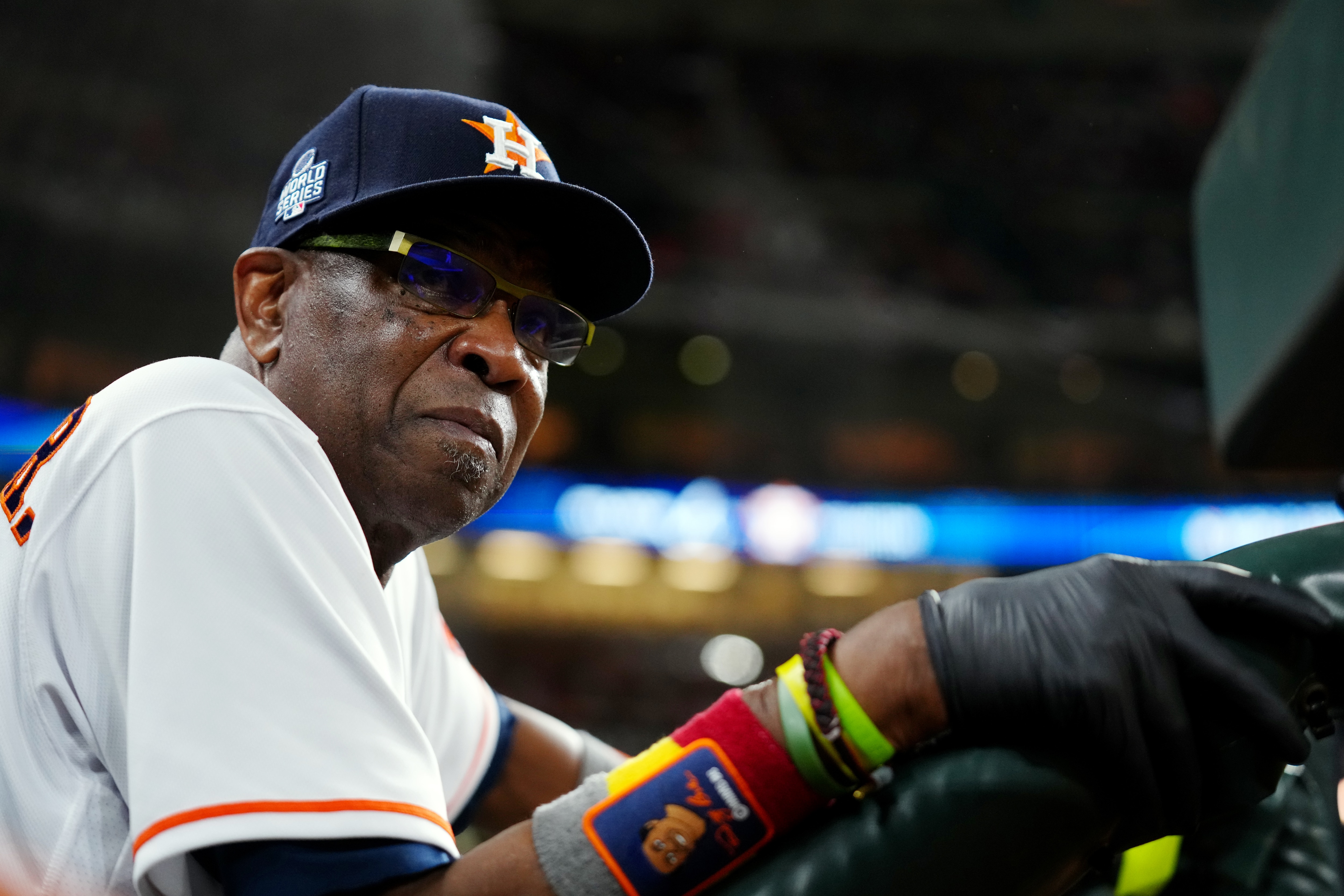 HOUSTON, TX - OCTOBER 26:  Manager Dusty Baker #12 of the Houston Astros looks on from the dugout during Game 1 of the 2021 World Series between the Atlanta Braves and the Houston Astros at Minute Maid Park on Tuesday, October 26, 2021 in Houston, Texas. (Photo by Daniel Shirey/MLB Photos via Getty Images)