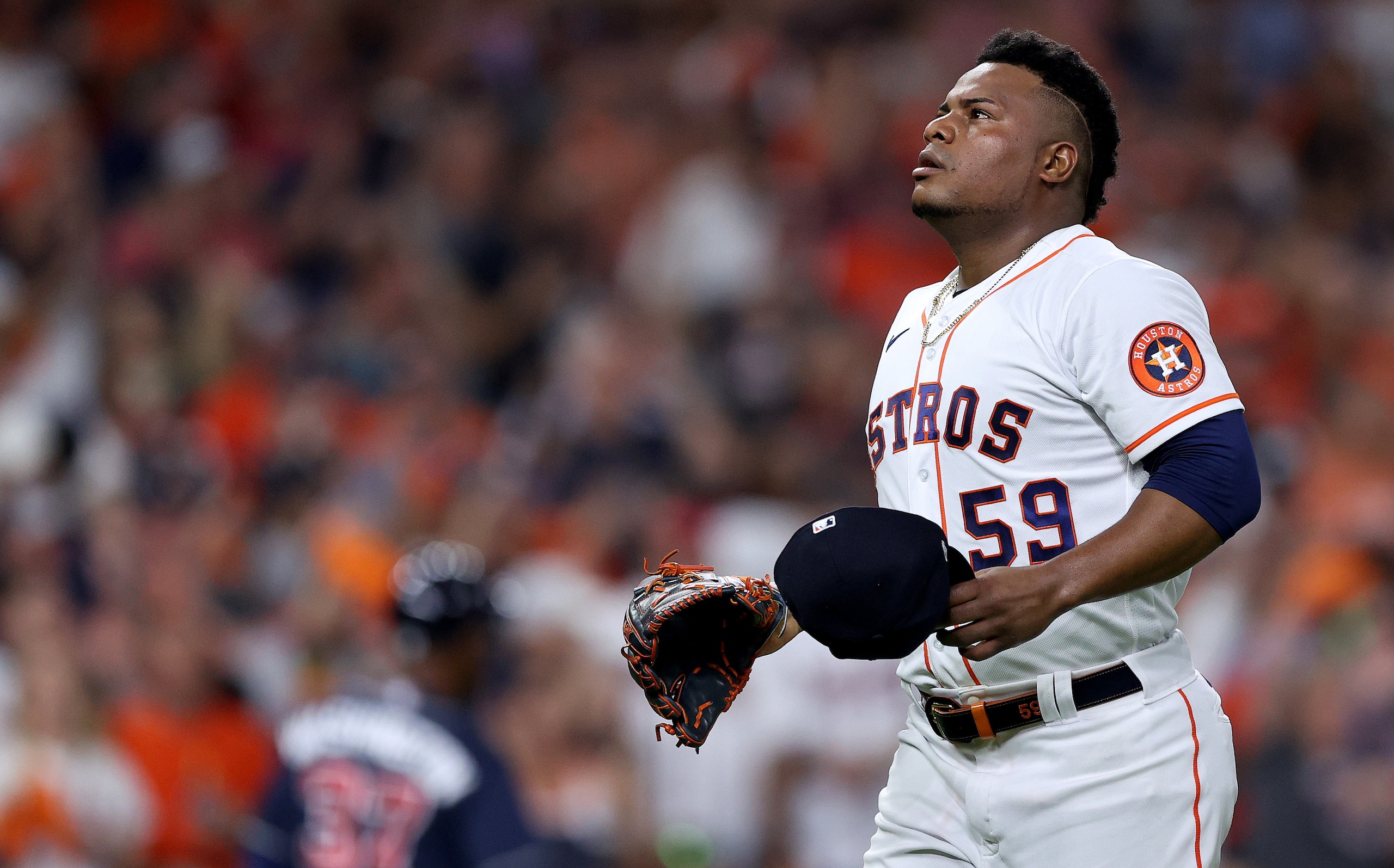 HOUSTON, TEXAS - OCTOBER 26: Framber Valdez #59 of the Houston Astros reacts after retiring the side during the first inning against the Atlanta Braves in Game One of the World Series at Minute Maid Park on October 26, 2021 in Houston, Texas. (Photo by Elsa/Getty Images) HOUSTON, TEXAS - OCTOBER 26: Framber Valdez #59 of the Houston Astros reacts after retiring the side during the first inning against the Atlanta Braves in Game One of the World Series at Minute Maid Park on October 26, 2021 in Houston, Texas. (Photo by Elsa/Getty Images)