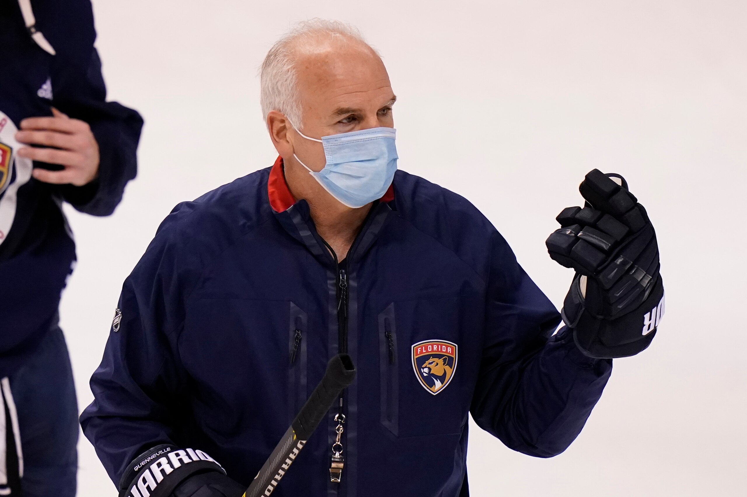 FILE - Florida Panthers head coach Joel Quenneville talks with the team during NHL hockey training camp in Sunrise, Fla., in this Wednesday, Jan. 6, 2021, file photo. Year 2 of the Joel Quenneville coaching era Florida has the Panthers looking very much like a Stanley Cup contender. At the midpoint of this season, the Panthers are 19-5-4, tied for the most points in the NHL entering Tuesday and off to the best 28-game start in their history. (AP Photo/Lynne Sladky, File)