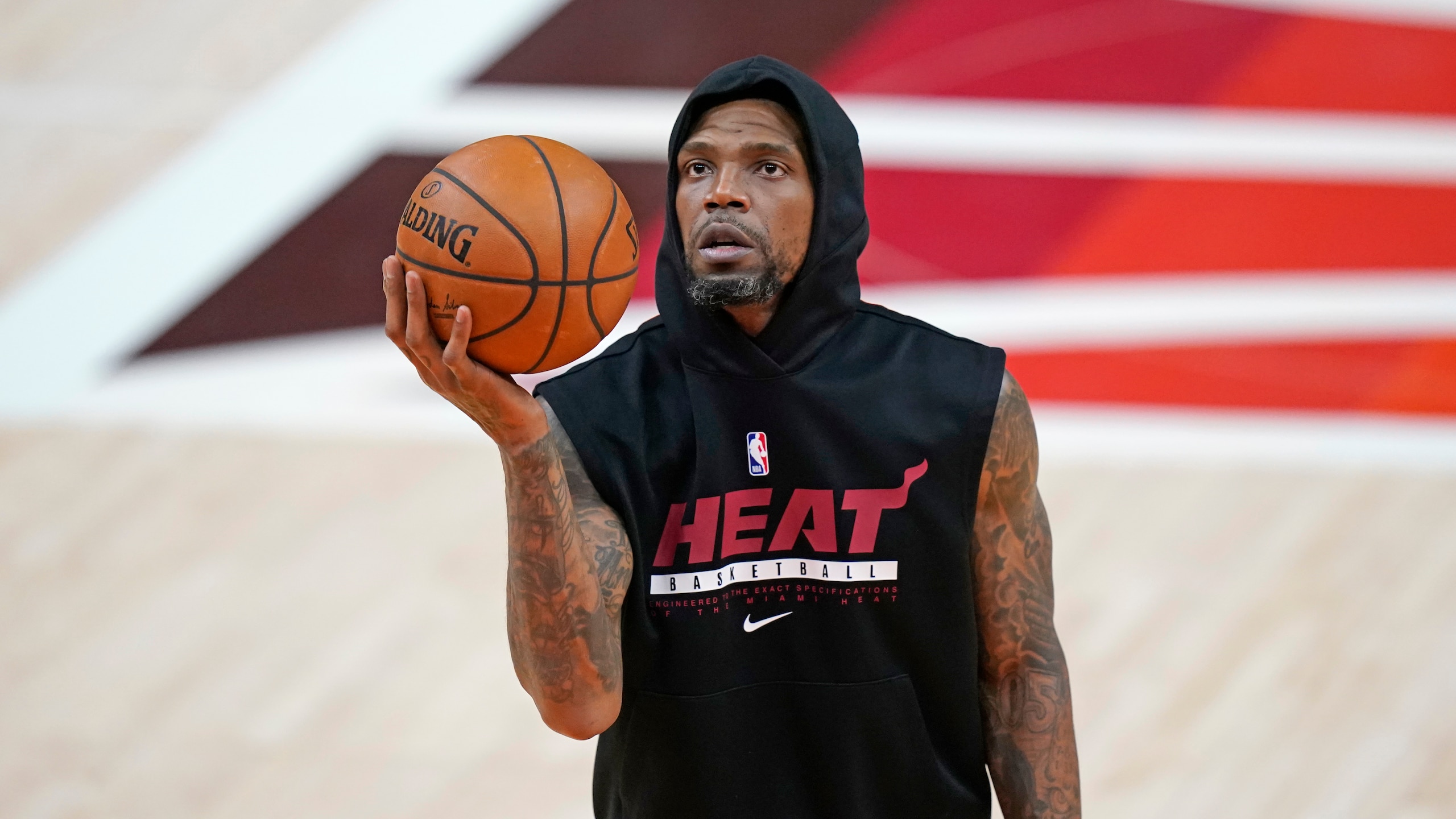 Miami Heat forward Udonis Haslem warms up before an NBA basketball game against the Utah Jazz Saturday, Feb. 13, 2021, in Salt Lake City. (AP Photo/Rick Bowmer)