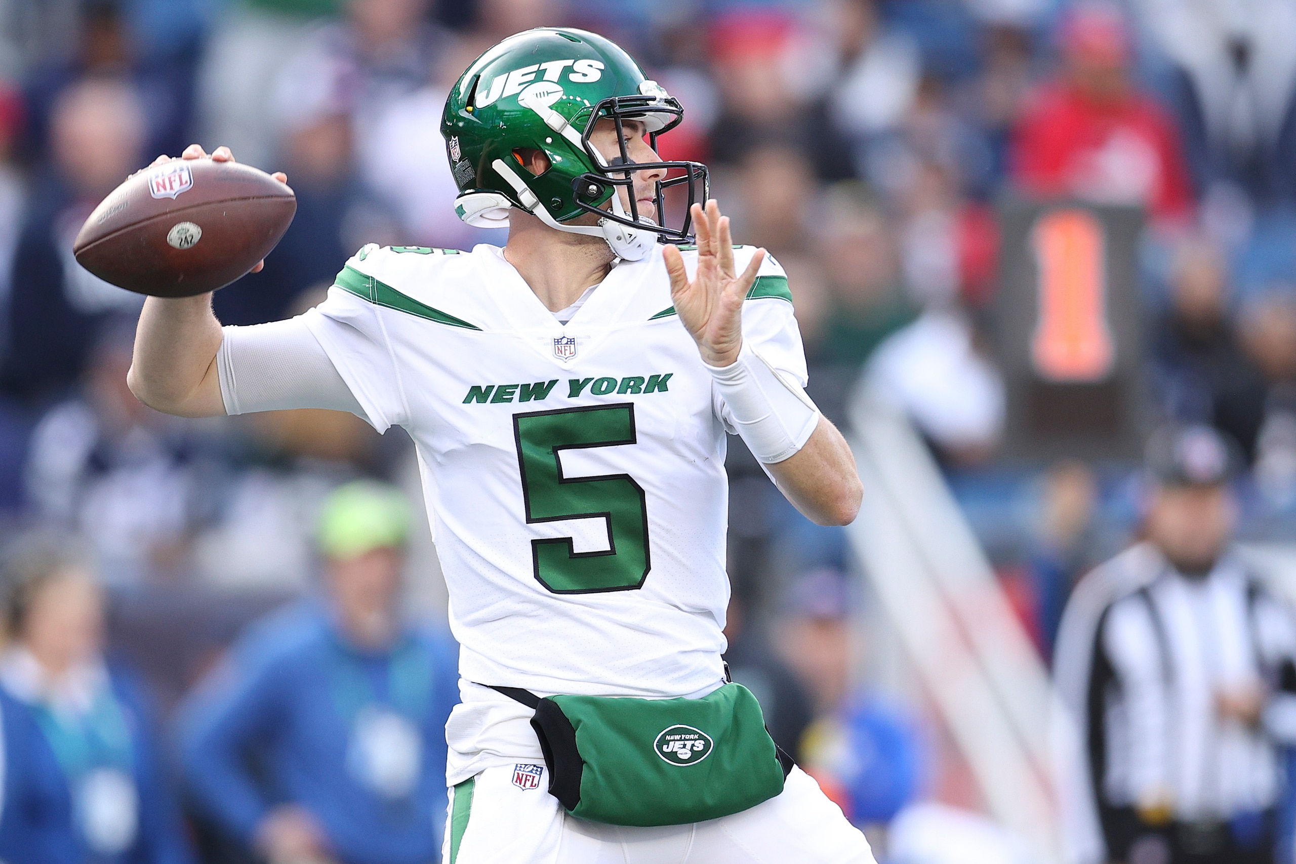 FOXBOROUGH, MASSACHUSETTS - OCTOBER 24: Mike White #5 of the New York Jets makes a pass play in the fourth quarter of game against the New England Patriots at Gillette Stadium on October 24, 2021 in Foxborough, Massachusetts. (Photo by Maddie Meyer/Getty Images)