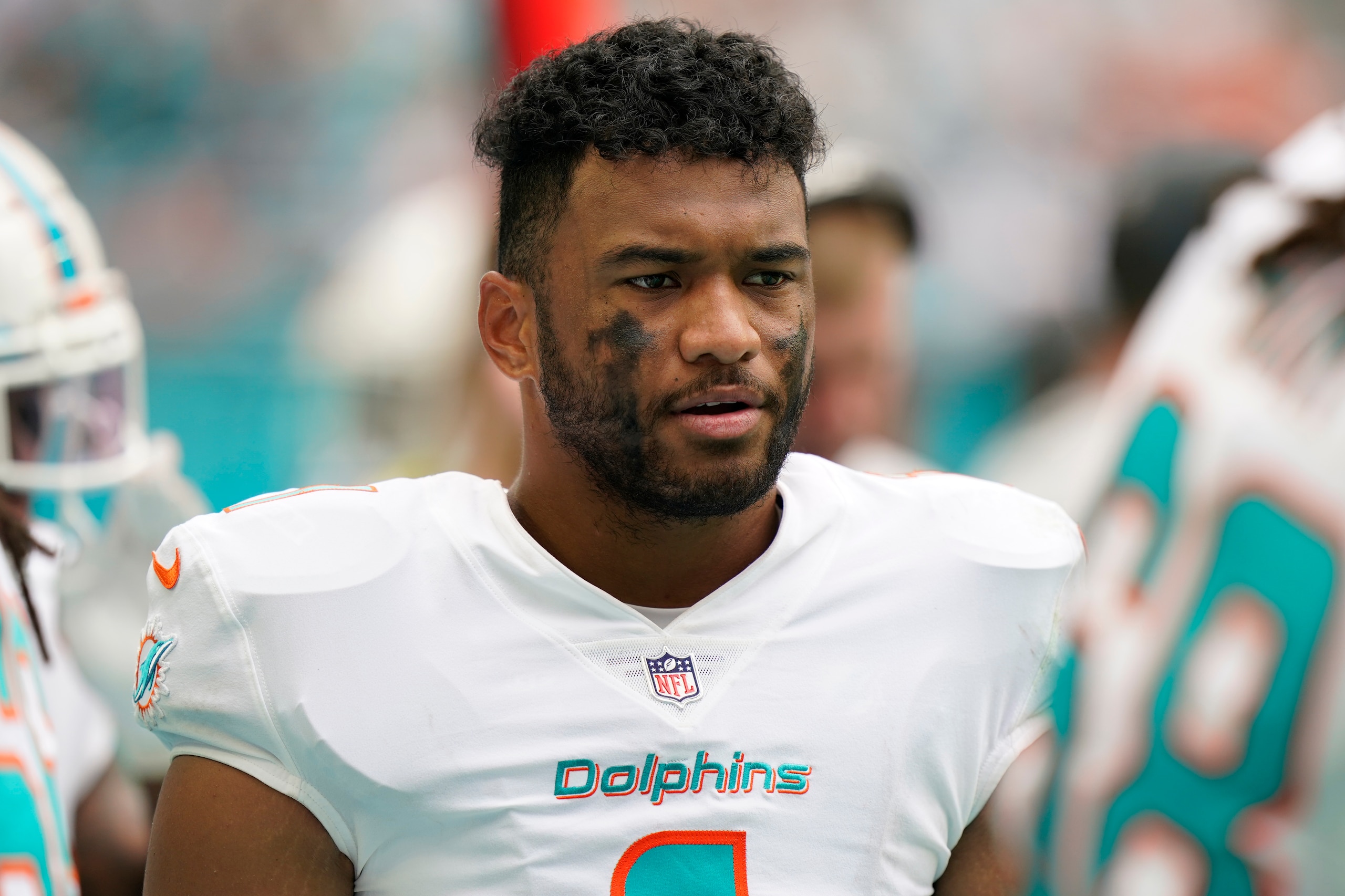 Miami Dolphins quarterback Tua Tagovailoa (1) walks the sidelines during the second half of an NFL football game Atlanta Falcons, Sunday, Oct. 24, 2021, in Miami Gardens, Fla. (AP Photo/Wilfredo Lee)