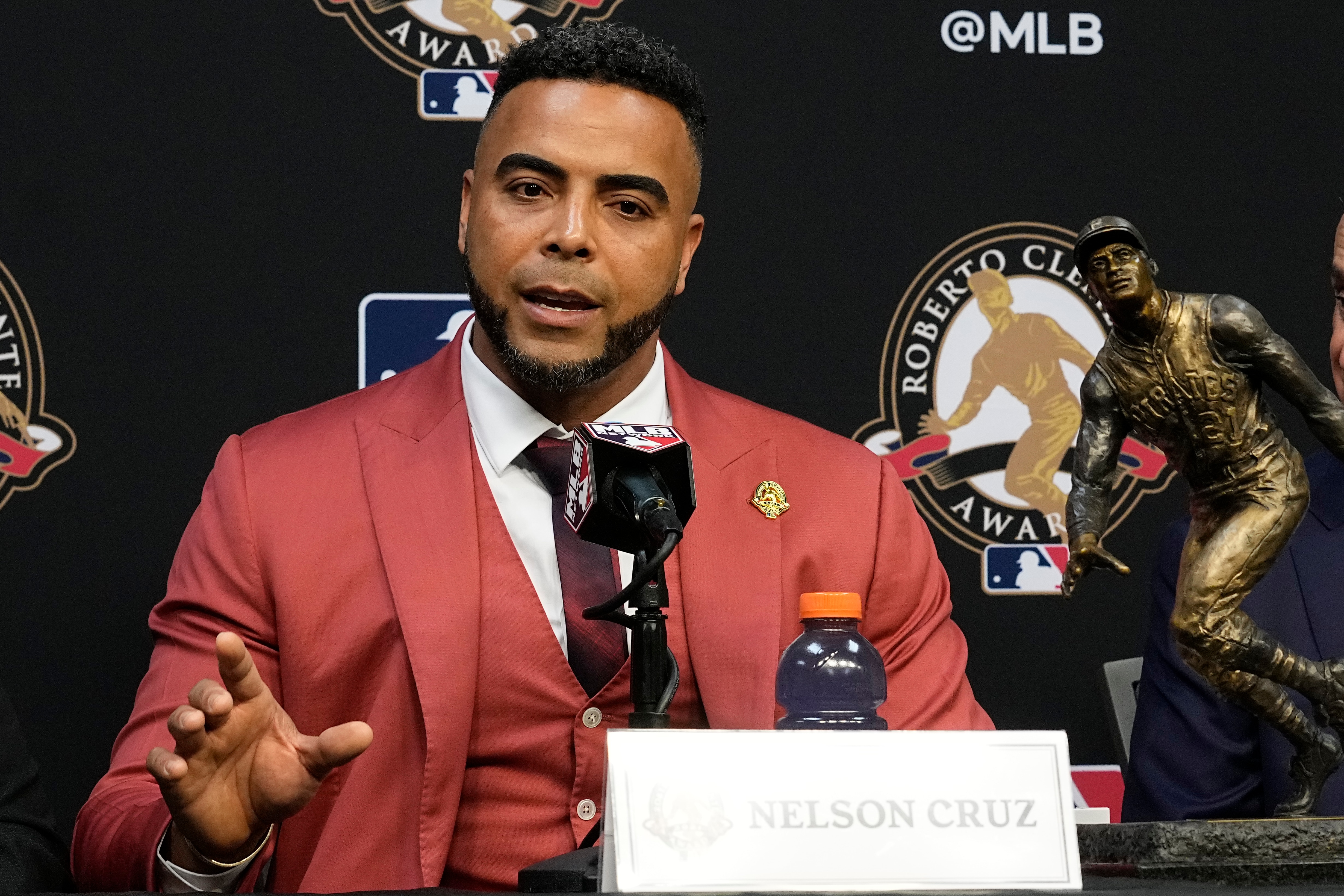 Nelson Cruz, 2021 Roberto Clemente Award winner speaks during a news conference before Game 2 of baseball's World Series between the Houston Astros and the Atlanta Braves Wednesday, Oct. 27, 2021, in Houston.(AP Photo/Sue Ogrocki) Nelson Cruz, 2021 Roberto Clemente Award winner speaks during a news conference before Game 2 of baseball's World Series between the Houston Astros and the Atlanta Braves Wednesday, Oct. 27, 2021, in Houston.(AP Photo/Sue Ogrocki)