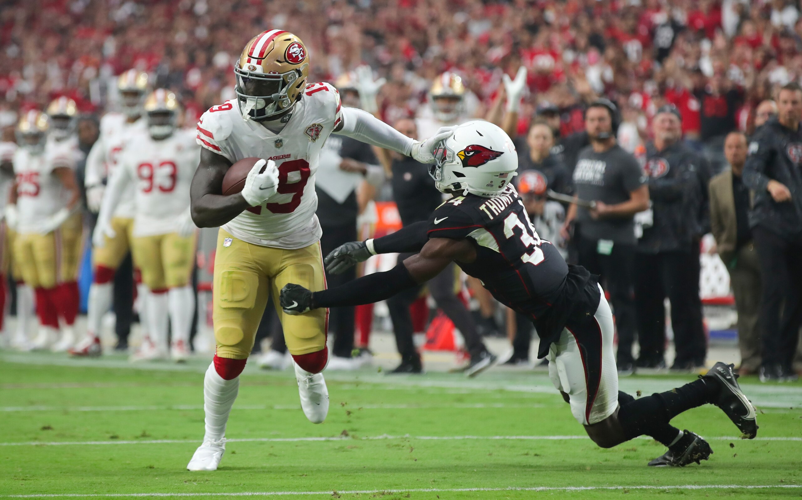 GLENDALE, AZ - OCTOBER 10: Deebo Samuel #19 of the San Francisco 49ers rushes for a 13-yard field goal during the game against the Arizona Cardinals at State Farm Stadium on October 10, 2021 in Glendale, Arizona. The Cardinals defeated the 49ers 17-10. (Photo by Michael Zagaris/San Francisco 49ers/Getty Images)