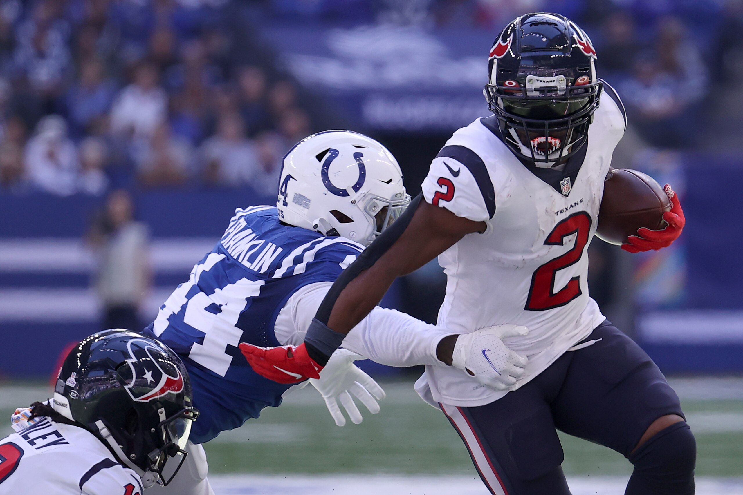 INDIANAPOLIS, INDIANA - OCTOBER 17: Mark Ingram #2 of the Houston Texans is tackled by Zaire Franklin #44 of the Indianapolis Colts in the first half at Lucas Oil Stadium on October 17, 2021 in Indianapolis, Indiana. (Photo by Andy Lyons/Getty Images)
