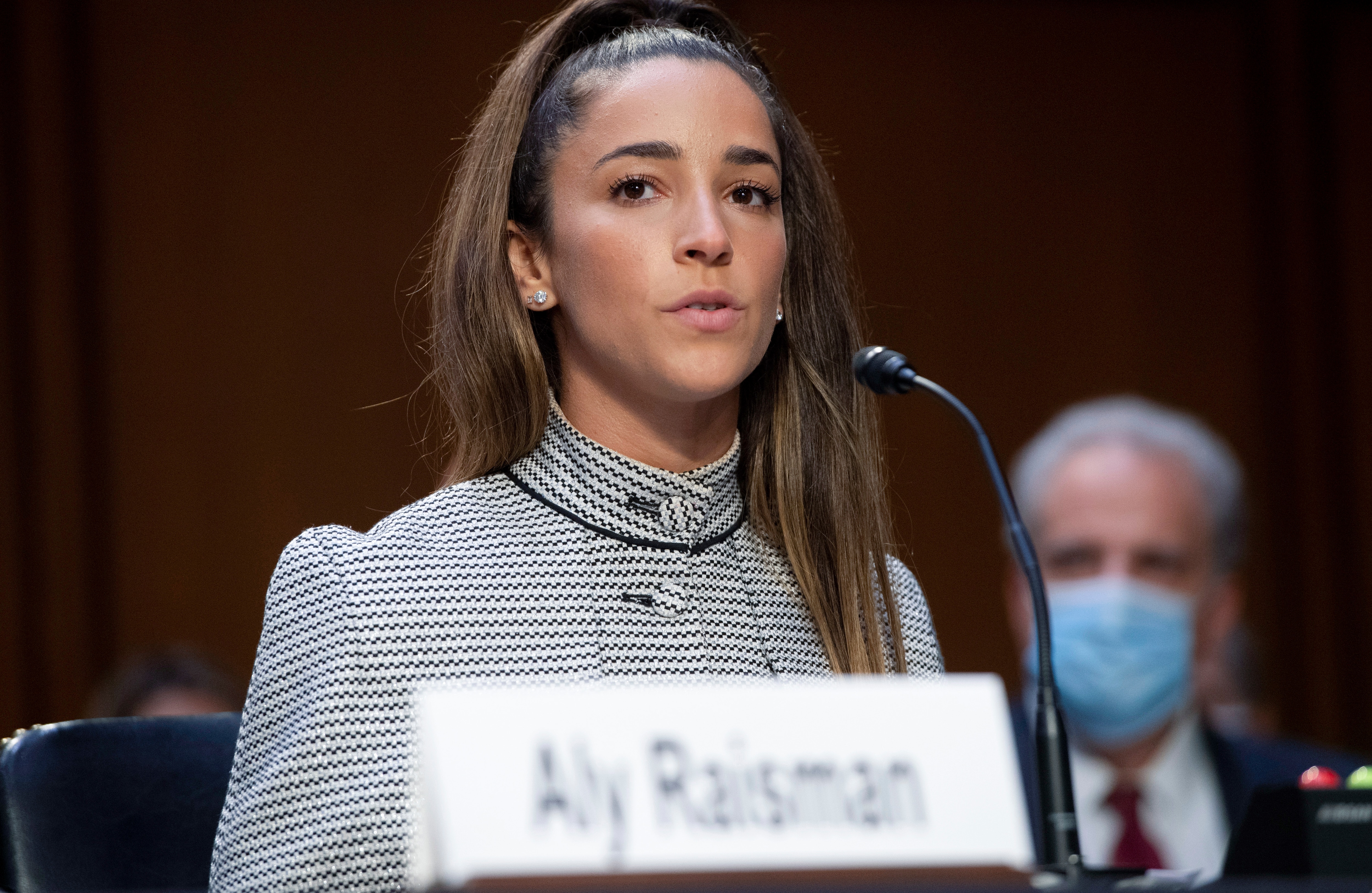 United States Olympic gymnast Aly Raisman testifies during a Senate Judiciary hearing about the Inspector General's report on the FBI's handling of the Larry Nassar investigation on Capitol Hill, Wednesday, Sept. 15, 2021, in Washington. Nassar was charged in 2016 with federal child pornography offenses and sexual abuse charges in Michigan. He is now serving decades in prison after hundreds of girls and women said he sexually abused them under the guise of medical treatment when he worked for Michigan State and Indiana-based USA Gymnastics, which trains Olympians. (Saul Loeb/Pool via AP)