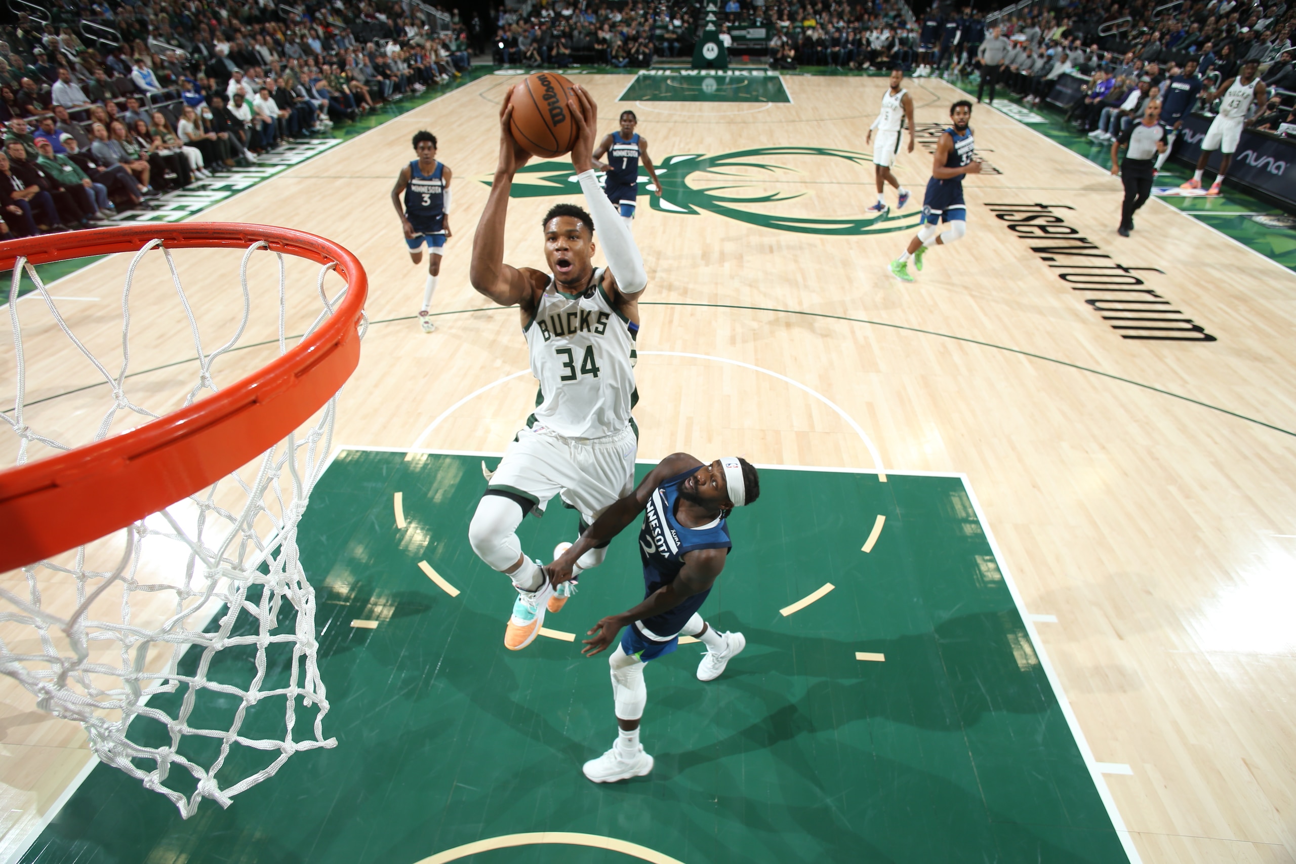 MILWAUKEE, WI - OCTOBER 27:  Giannis Antetokounmpo #34 of the Milwaukee Bucks shoots against Patrick Beverley #22 of the Minnesota Timberwolves during the NBA game at Fiserv Forum on October 27, 2021 in Milwaukee, Wisconsin. NOTE TO USER: User expressly acknowledges and agrees that, by downloading and/or using this photograph, user is consenting to the terms and conditions of the Getty Images License Agreement.  Mandatory Copyright Notice: Copyright 2021 NBAE (Photo by Gary Dineen/NBAE via Getty Images)