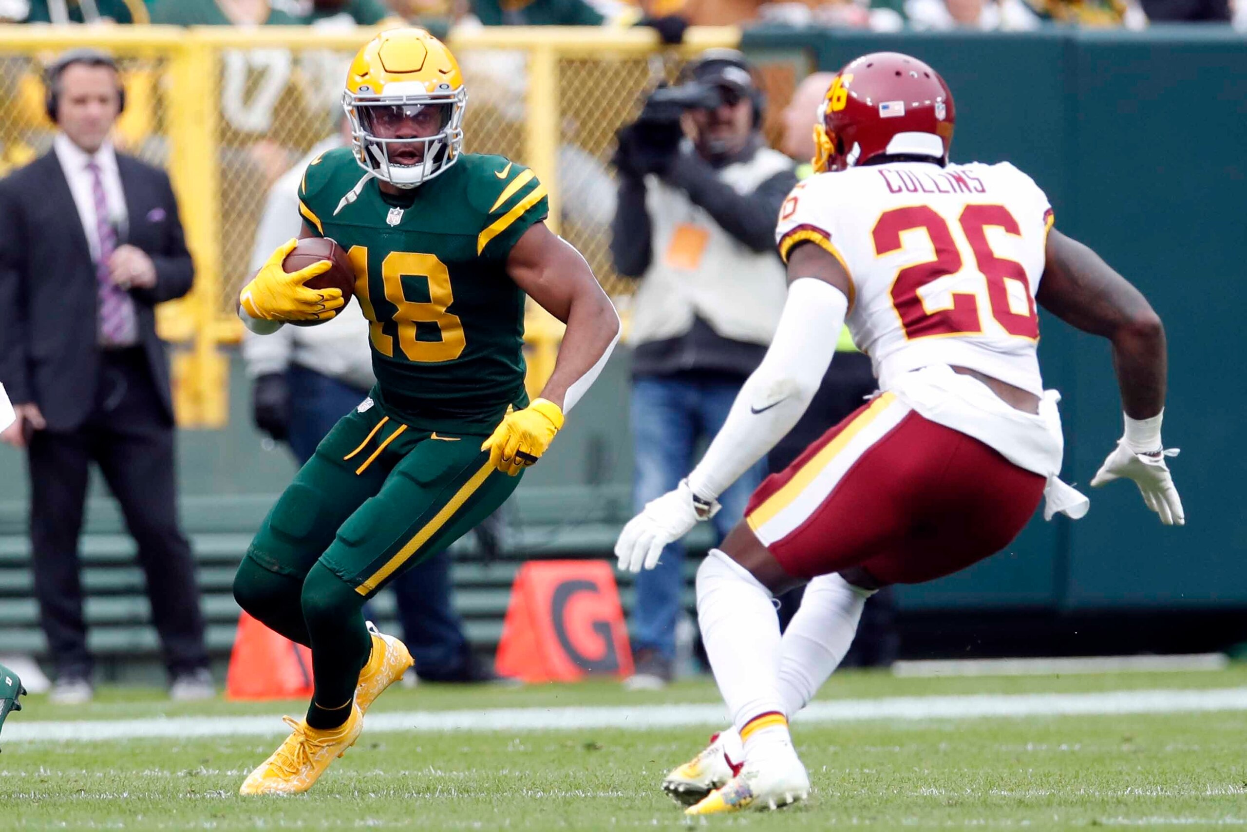 Green Bay Packers wide receiver Randall Cobb (18) tries to avoid Washington Football Team safety Landon Collins (26) during an NFL football game Sunday, Oct. 24, 2021, in Green Bay, Wis. (Jeff Haynes/AP Images for Panini) Green Bay Packers wide receiver Randall Cobb (18) tries to avoid Washington Football Team safety Landon Collins (26) during an NFL football game Sunday, Oct. 24, 2021, in Green Bay, Wis. (Jeff Haynes/AP Images for Panini)