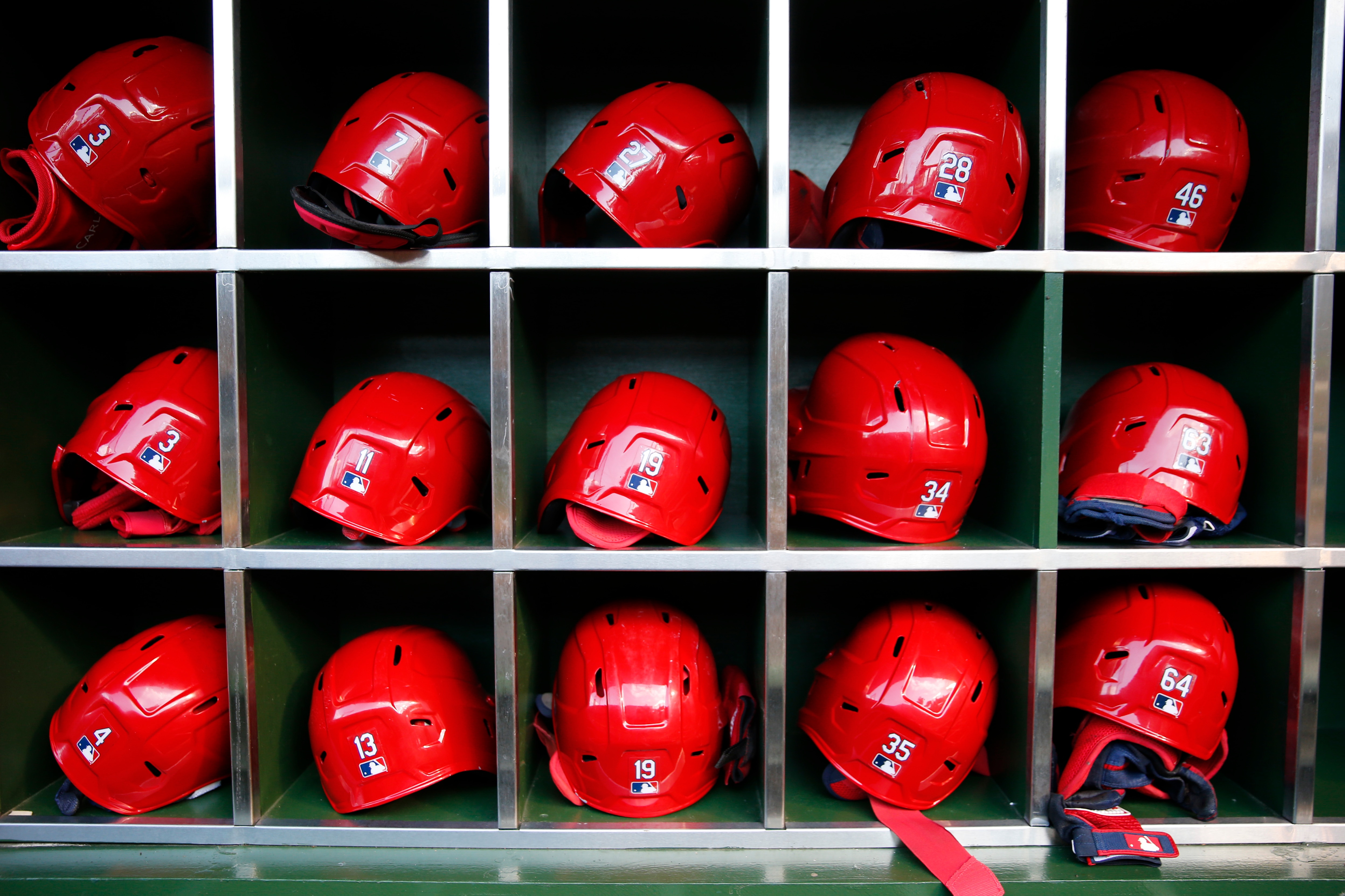 CHICAGO, IL - JUNE 12: Helmets belonging to St. Louis Cardinals players sit in the dugout prior to the game between the St. Louis Cardinals and the Chicago Cubs at Wrigley Field on Saturday, June 12, 2021 in Chicago, Illinois. (Photo by Nuccio DiNuzzo/MLB Photos via Getty Images) CHICAGO, IL - JUNE 12: Helmets belonging to St. Louis Cardinals players sit in the dugout prior to the game between the St. Louis Cardinals and the Chicago Cubs at Wrigley Field on Saturday, June 12, 2021 in Chicago, Illinois. (Photo by Nuccio DiNuzzo/MLB Photos via Getty Images)