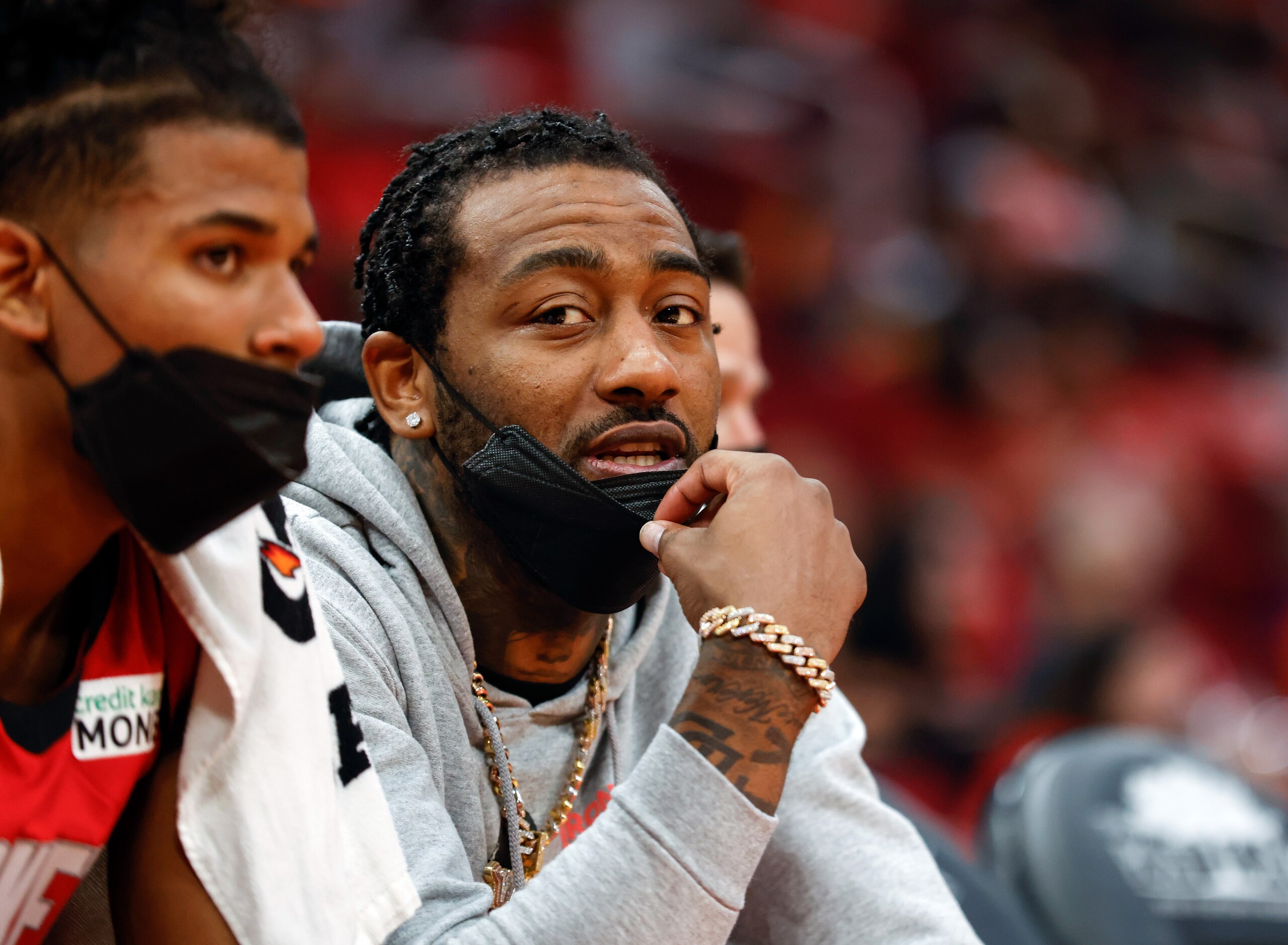 HOUSTON, TEXAS - OCTOBER 22: John Wall #1 of the Houston Rockets sits on the bench during the game against the Oklahoma City Thunder at Toyota Center on October 22, 2021 in Houston, Texas.  NOTE TO USER: User expressly acknowledges and agrees that, by downloading and or using this photograph, User is consenting to the terms and conditions of the Getty Images License Agreement. (Photo by Tim Warner/Getty Images)