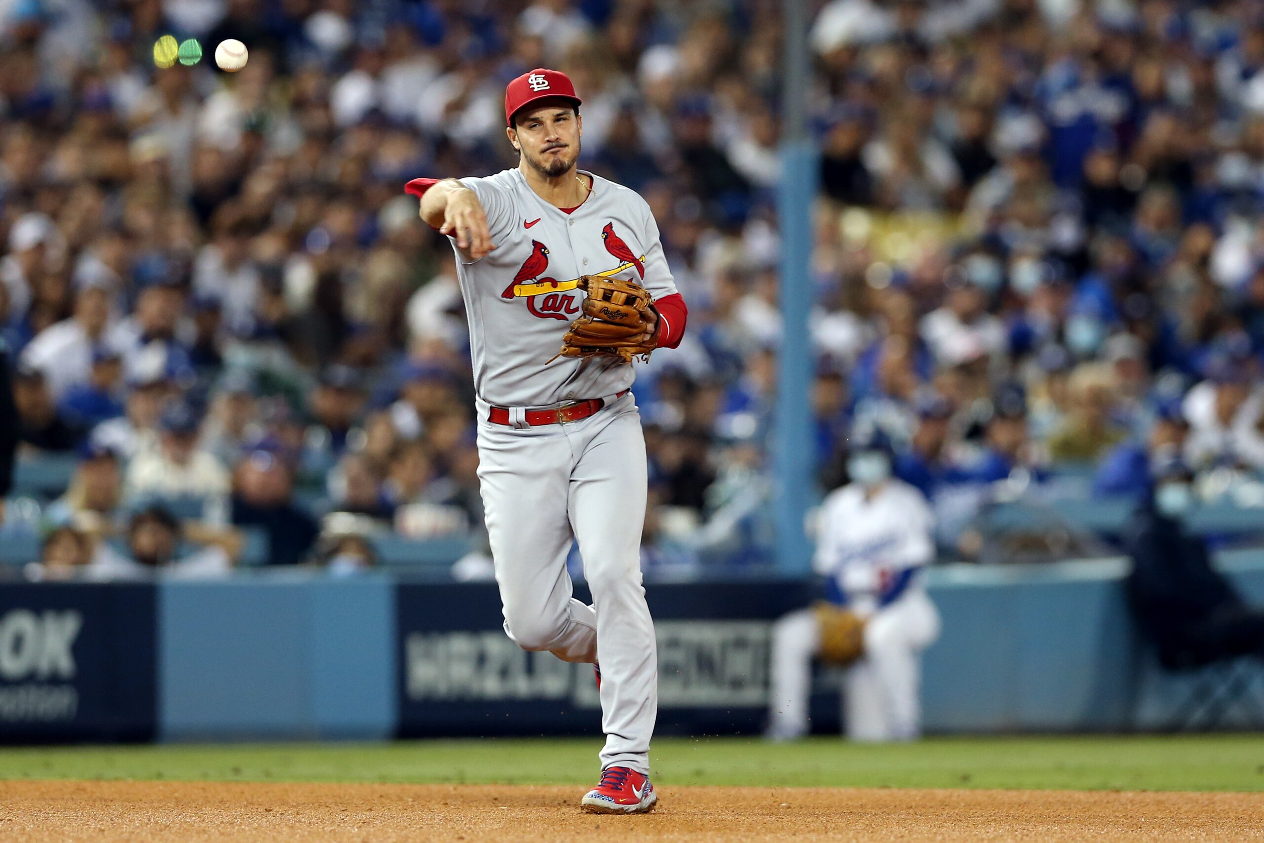 LOS ANGELES, CA - OCTOBER 06:  Nolan Arenado #28 of the St. Louis Cardinals throws the ball to first base during the game between the St. Louis Cardinals and the Los Angeles Dodgers at Dodgers Stadium on Wednesday, October 6, 2021 in Los Angeles, California. (Photo by Rob Leiter/MLB Photos via Getty Images)