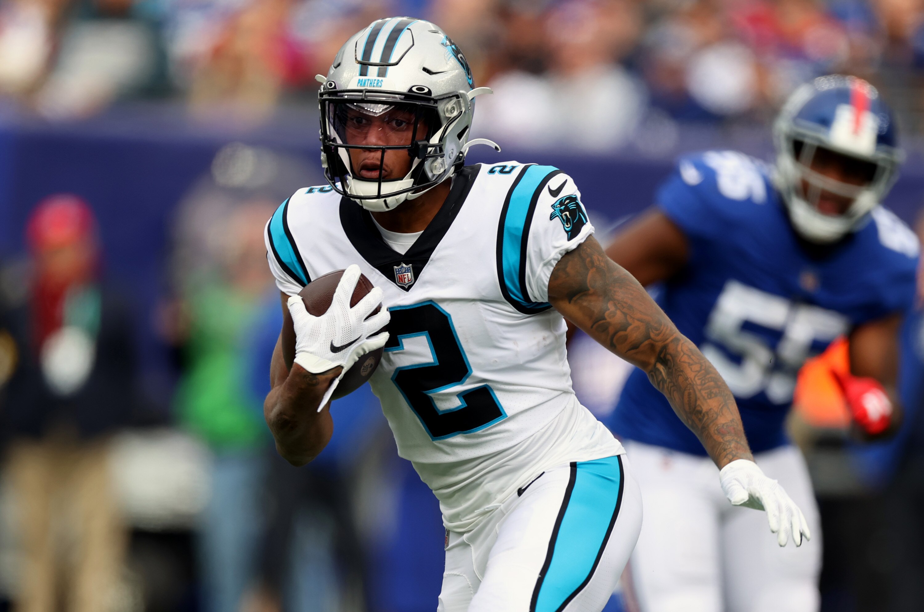 EAST RUTHERFORD, NEW JERSEY - OCTOBER 24: D.J. Moore #2 of the Carolina Panthers runs with the ball during the first half in the game against the New York Giants at MetLife Stadium on October 24, 2021 in East Rutherford, New Jersey. (Photo by Al Bello/Getty Images)