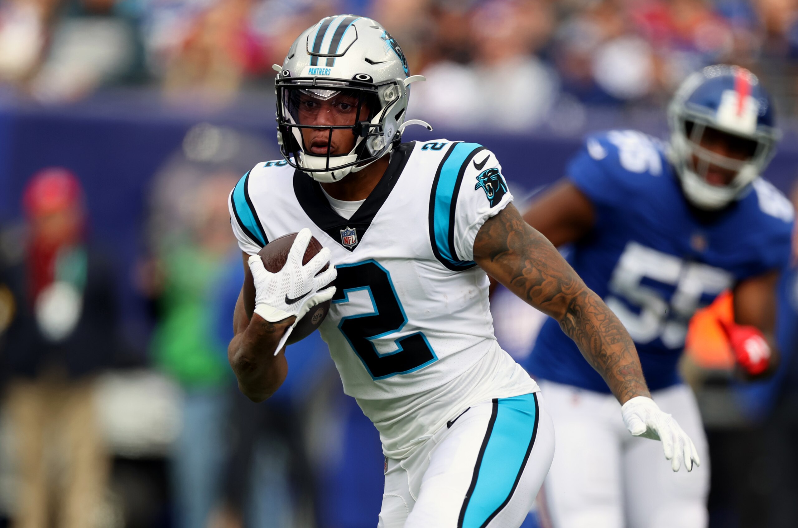 EAST RUTHERFORD, NEW JERSEY - OCTOBER 24: D.J. Moore #2 of the Carolina Panthers runs with the ball during the first half in the game against the New York Giants at MetLife Stadium on October 24, 2021 in East Rutherford, New Jersey. (Photo by Al Bello/Getty Images)