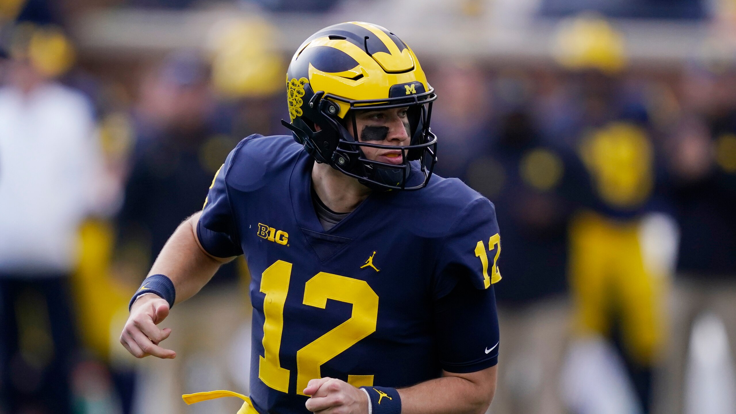 Michigan quarterback Cade McNamara plays during the first half of an NCAA college football game, Saturday, Oct. 23, 2021, in Ann Arbor, Mich. (AP Photo/Carlos Osorio) Michigan quarterback Cade McNamara plays during the first half of an NCAA college football game, Saturday, Oct. 23, 2021, in Ann Arbor, Mich. (AP Photo/Carlos Osorio)