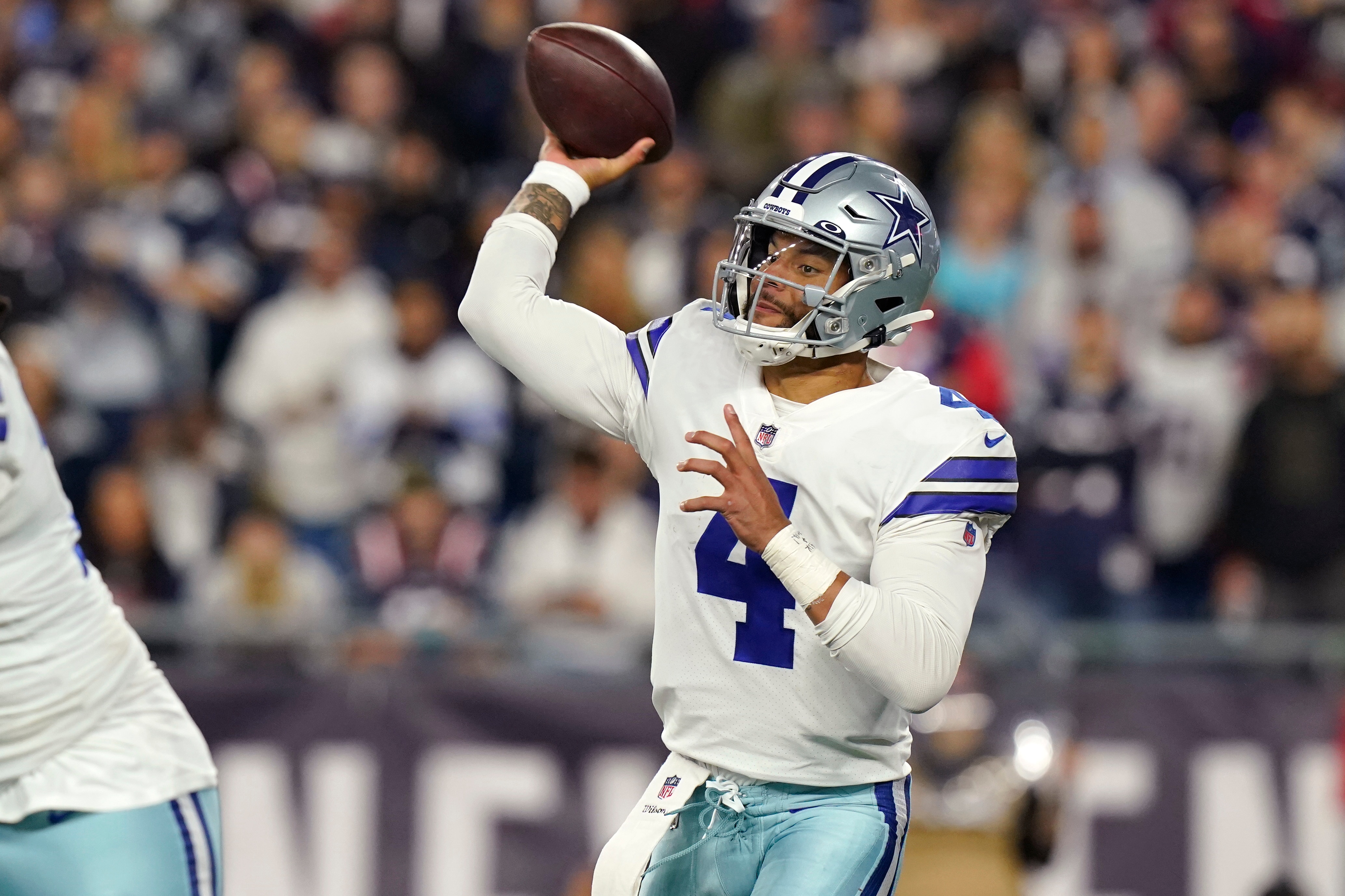 Dallas Cowboys quarterback Dak Prescott (4) throws during the second half of an NFL football game, Sunday, Oct. 17, 2021, in Foxborough, Mass. (AP Photo/Steven Senne)