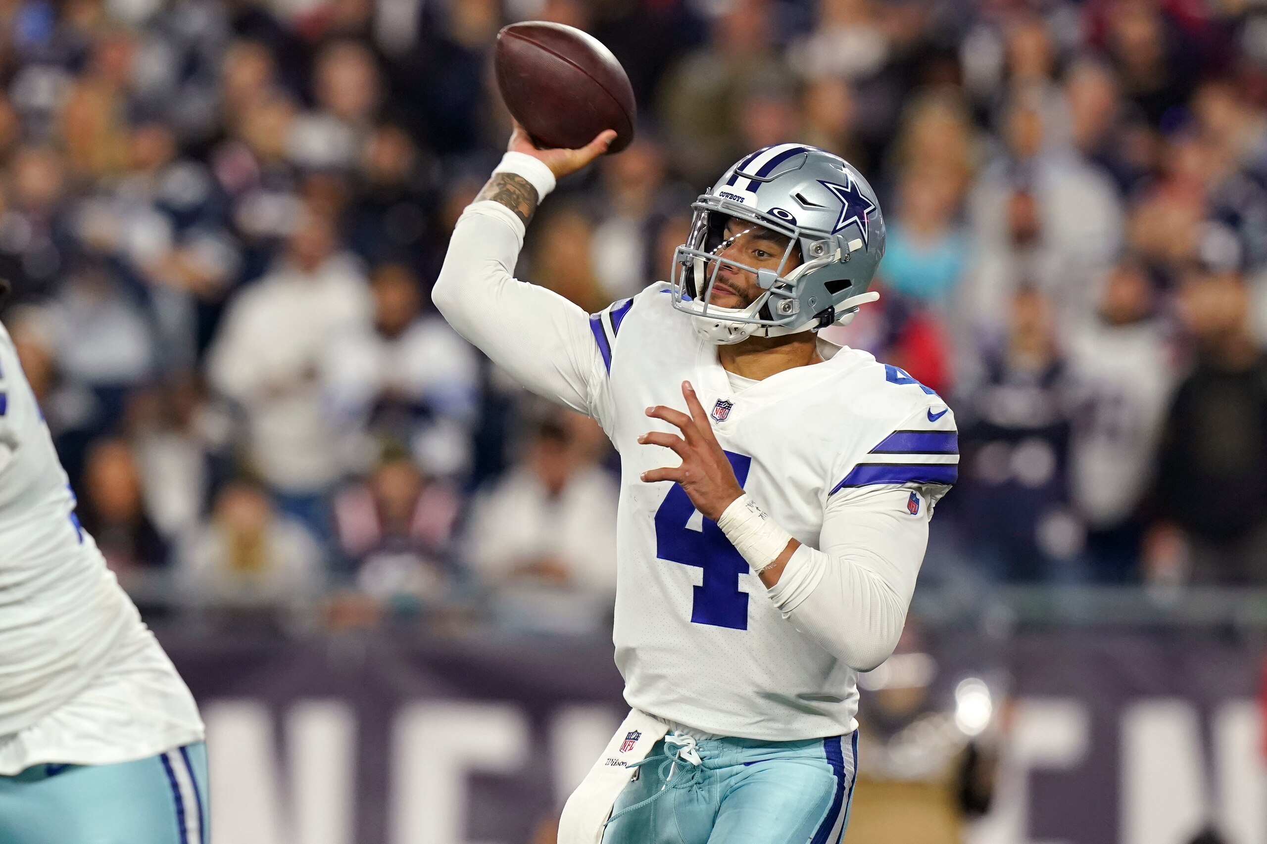 Dallas Cowboys quarterback Dak Prescott (4) throws during the second half of an NFL football game, Sunday, Oct. 17, 2021, in Foxborough, Mass. (AP Photo/Steven Senne)