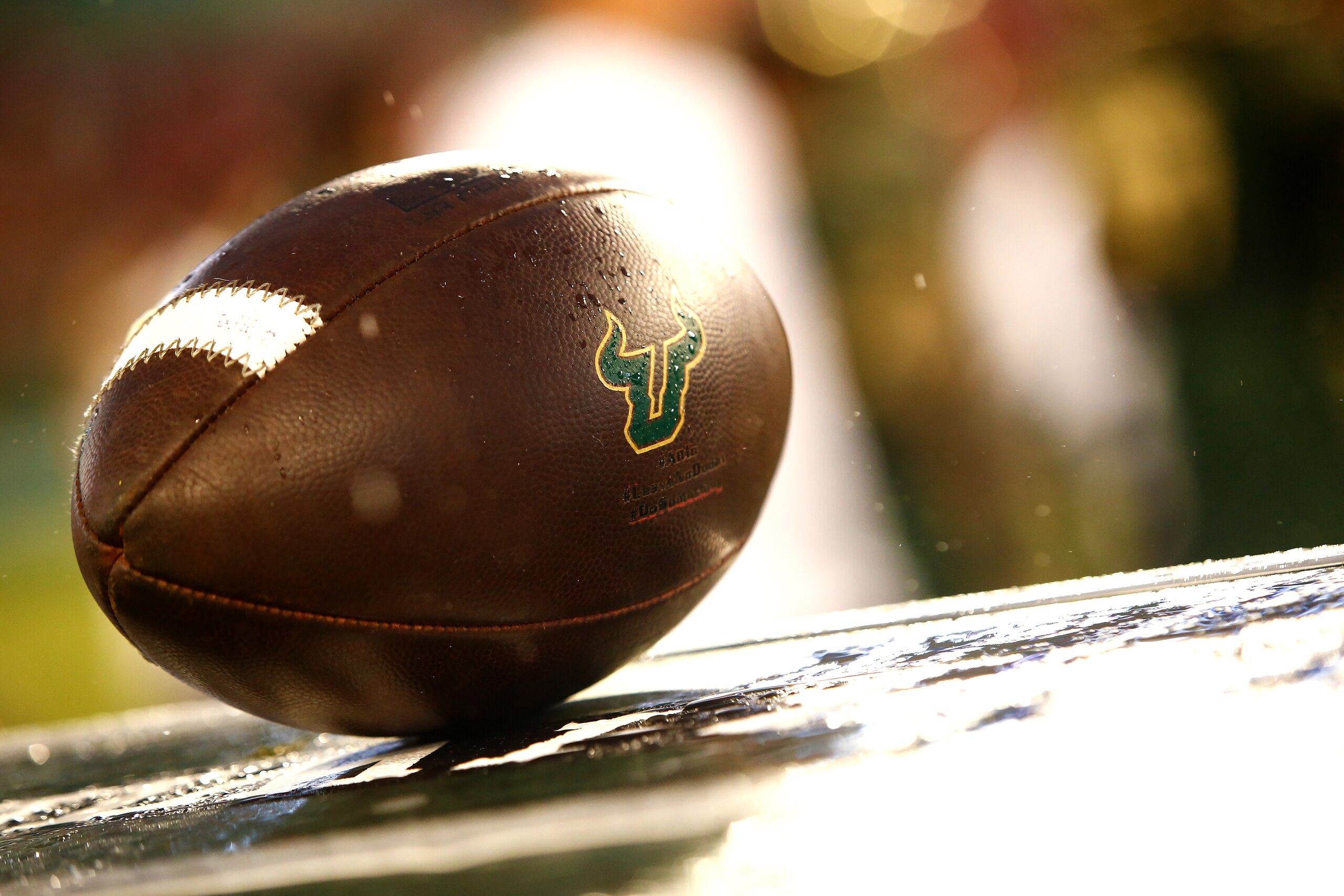 TAMPA, FL - OCTOBER 28: A football adorned with the South Florida Bulls logo sits on a crate on the sidelines during the fourth quarter of an NCAA football game between the Bulls and the Houston Cougars on October 28, 2017 at Raymond James Stadium in Tampa, Florida. (Photo by Brian Blanco/Getty Images)